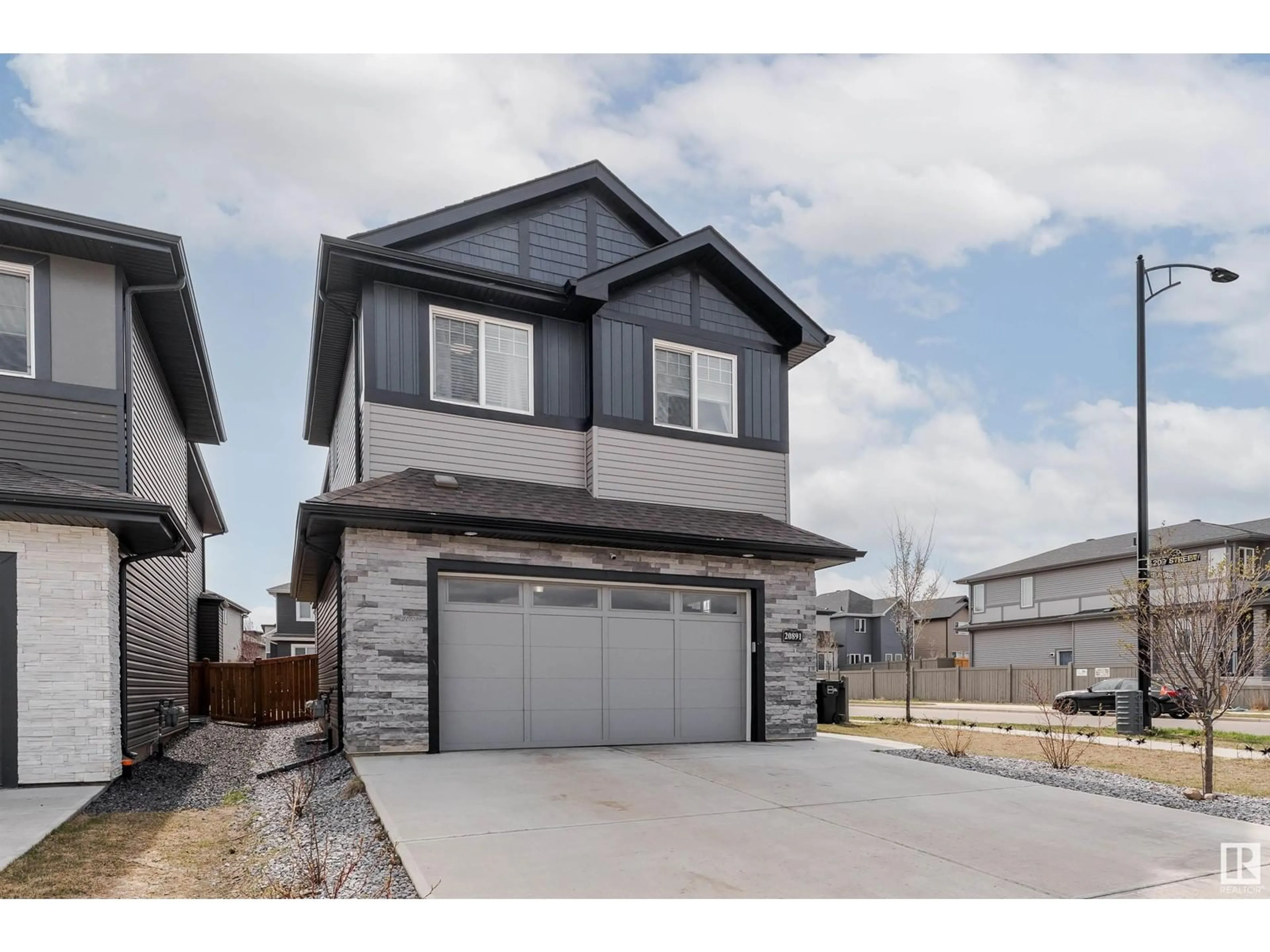 Home with vinyl exterior material, street for 20891 131 AV, Edmonton Alberta T5S0L4