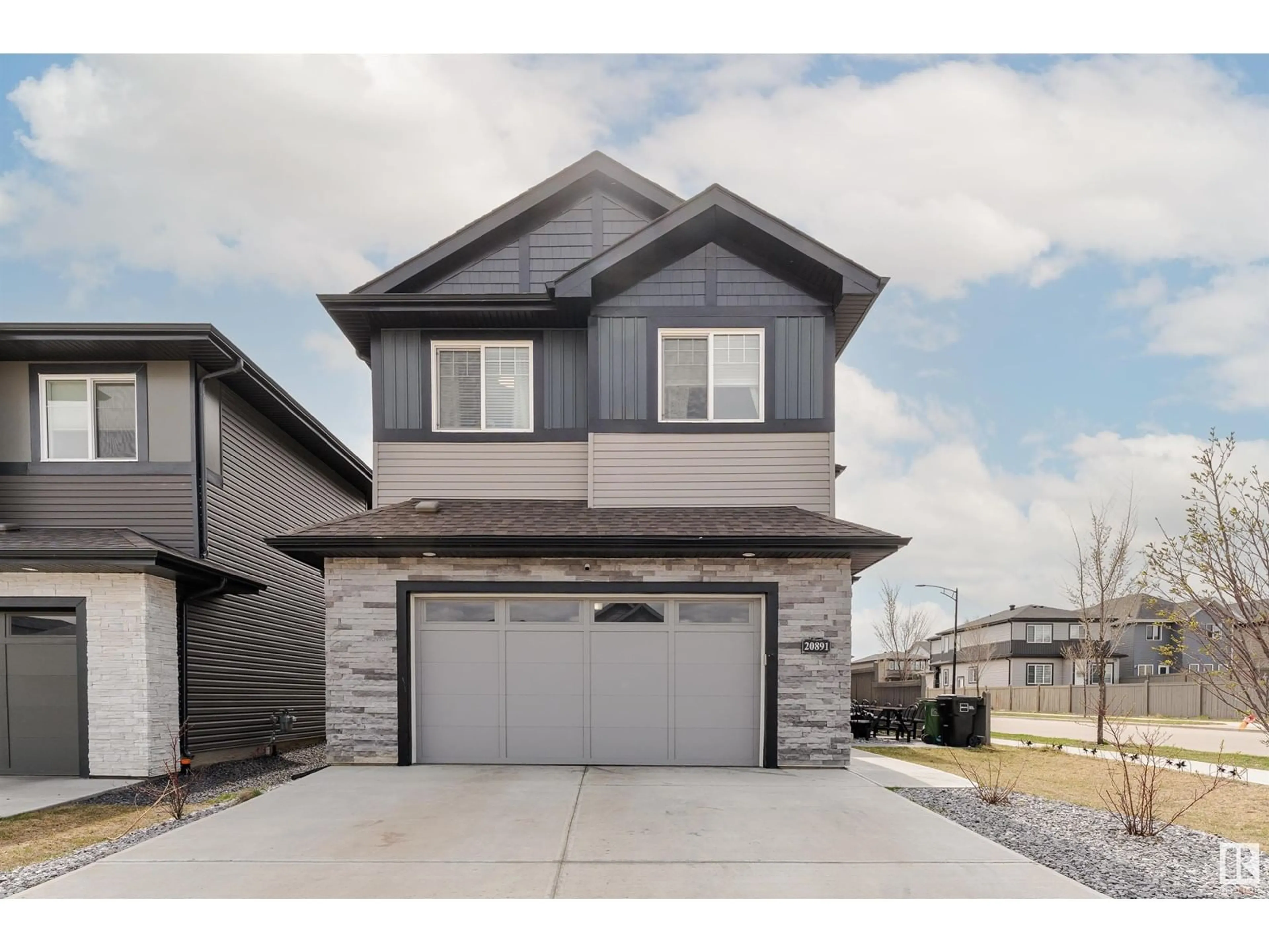 Home with vinyl exterior material, street for 20891 131 AV, Edmonton Alberta T5S0L4