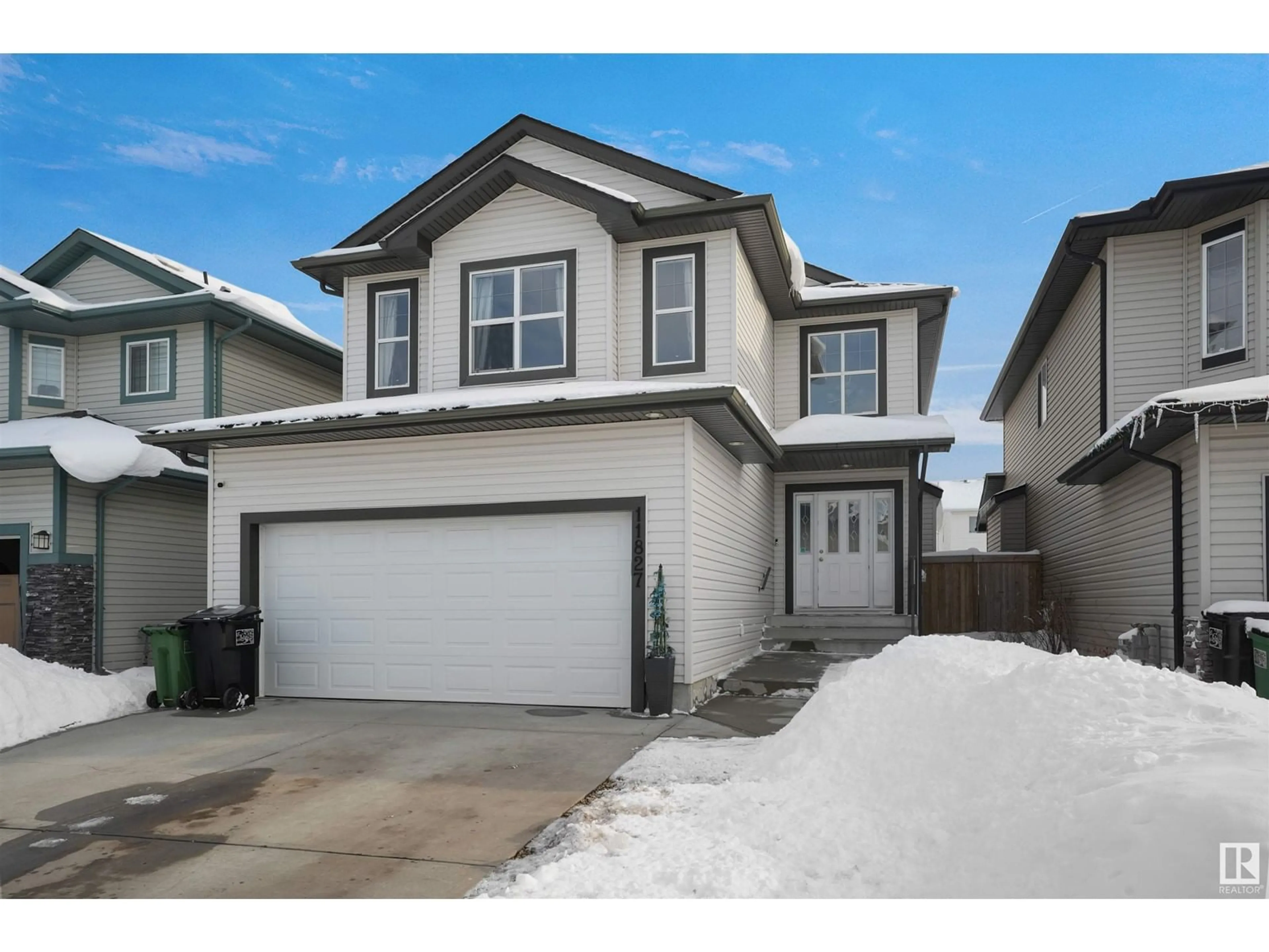 Home with vinyl exterior material, street for 11827 174 AV, Edmonton Alberta T5X0A6