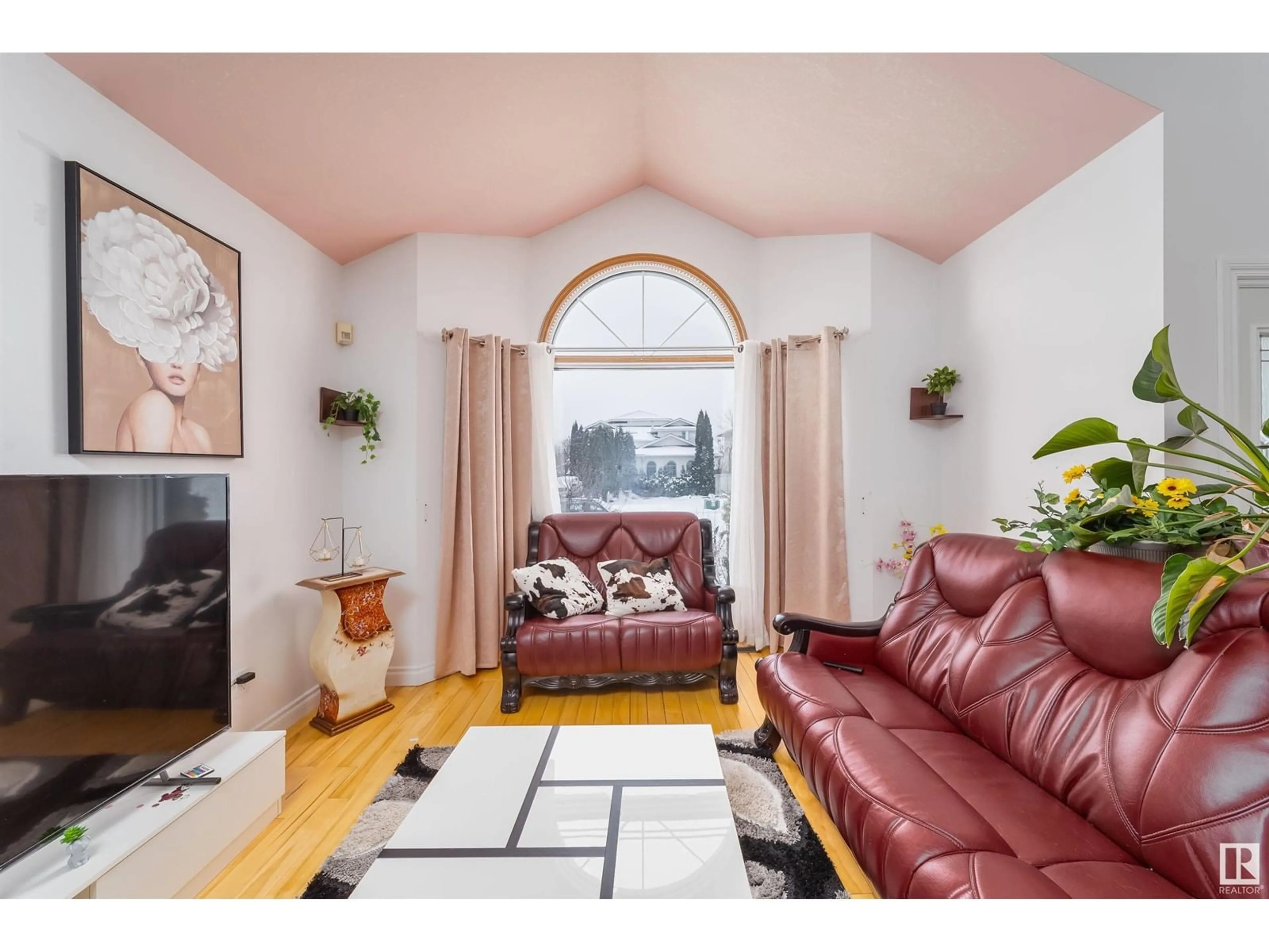 Living room with furniture, wood/laminate floor for NW - 7220 158 AV, Edmonton Alberta T5Z2Z6