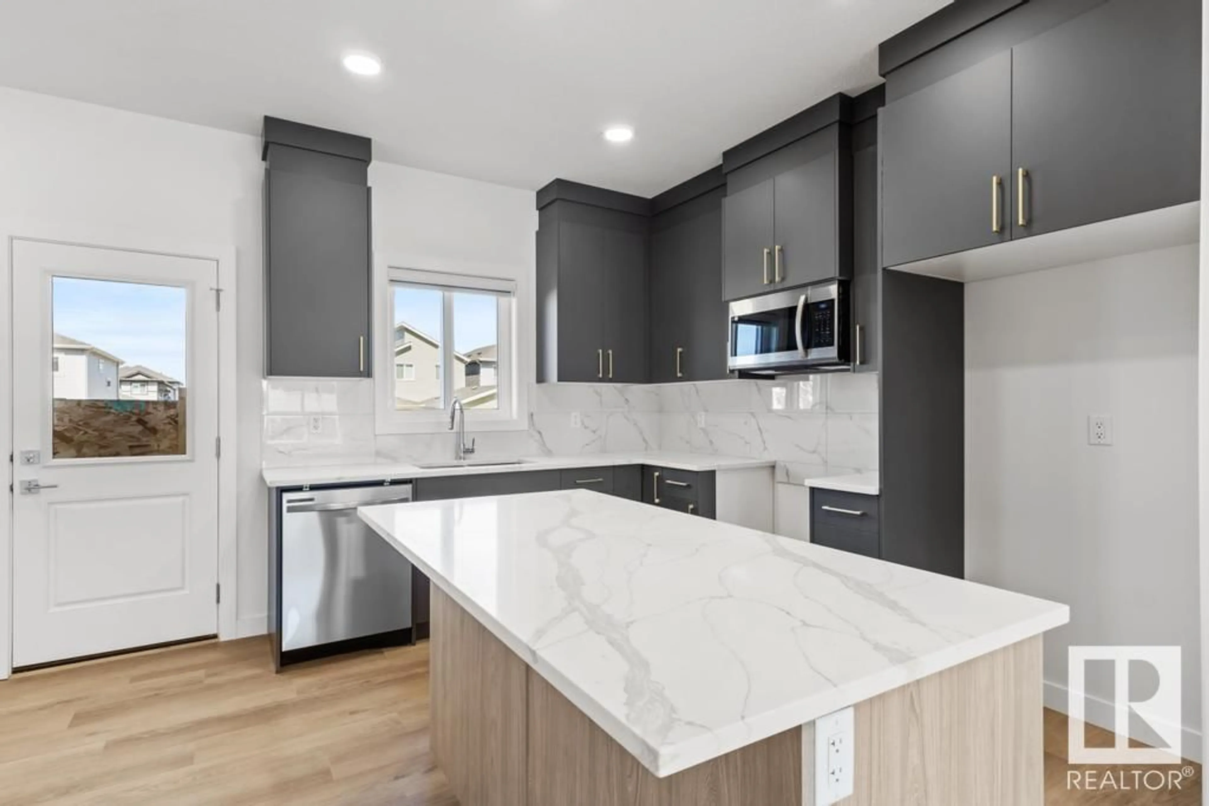 Open concept kitchen, ceramic/tile floor for 186 STARLING, Fort Saskatchewan Alberta T8L1X5