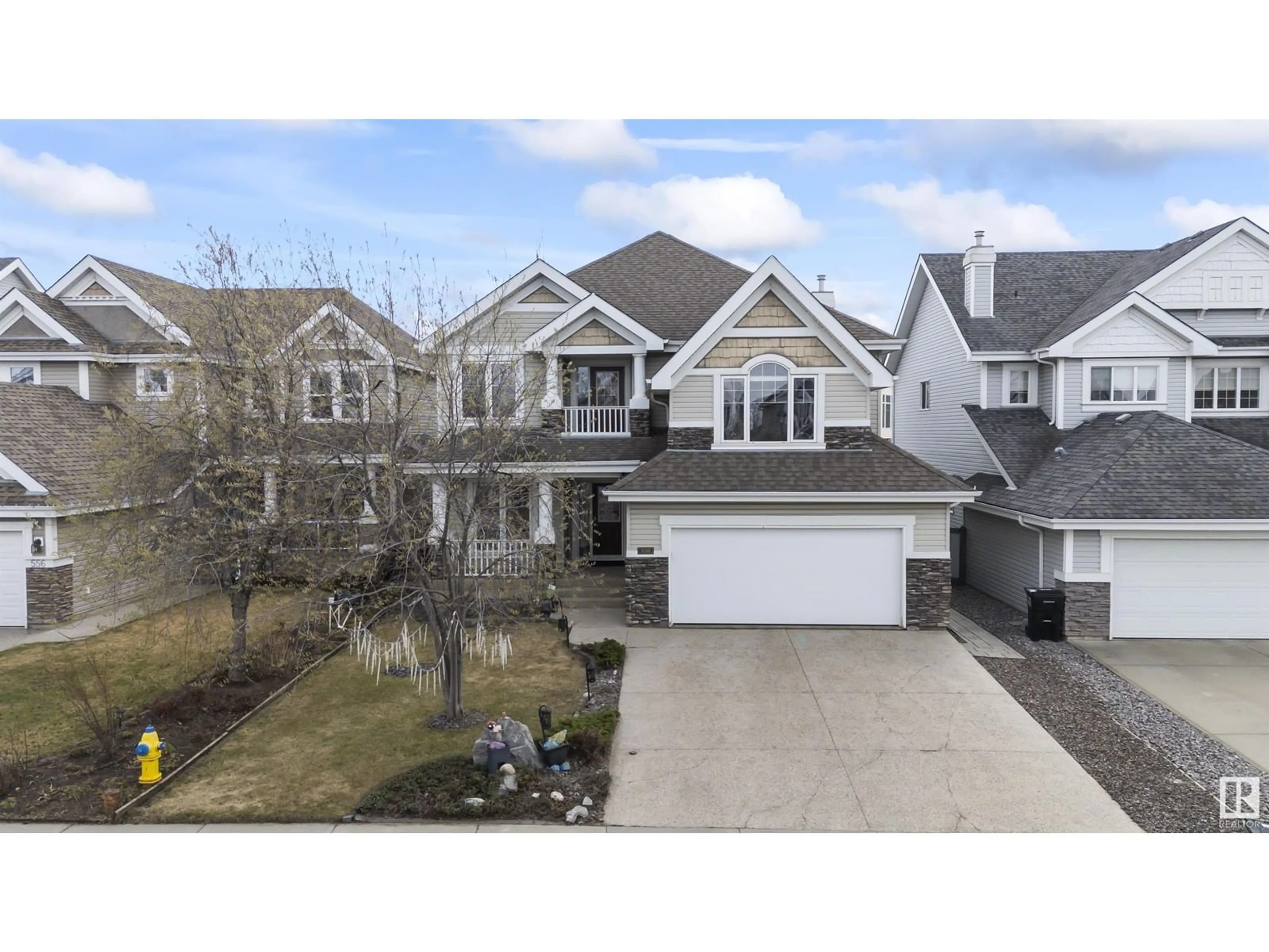 A pic from outside/outdoor area/front of a property/back of a property/a pic from drone, street for 558 STEWART CR, Edmonton Alberta T6X1B5