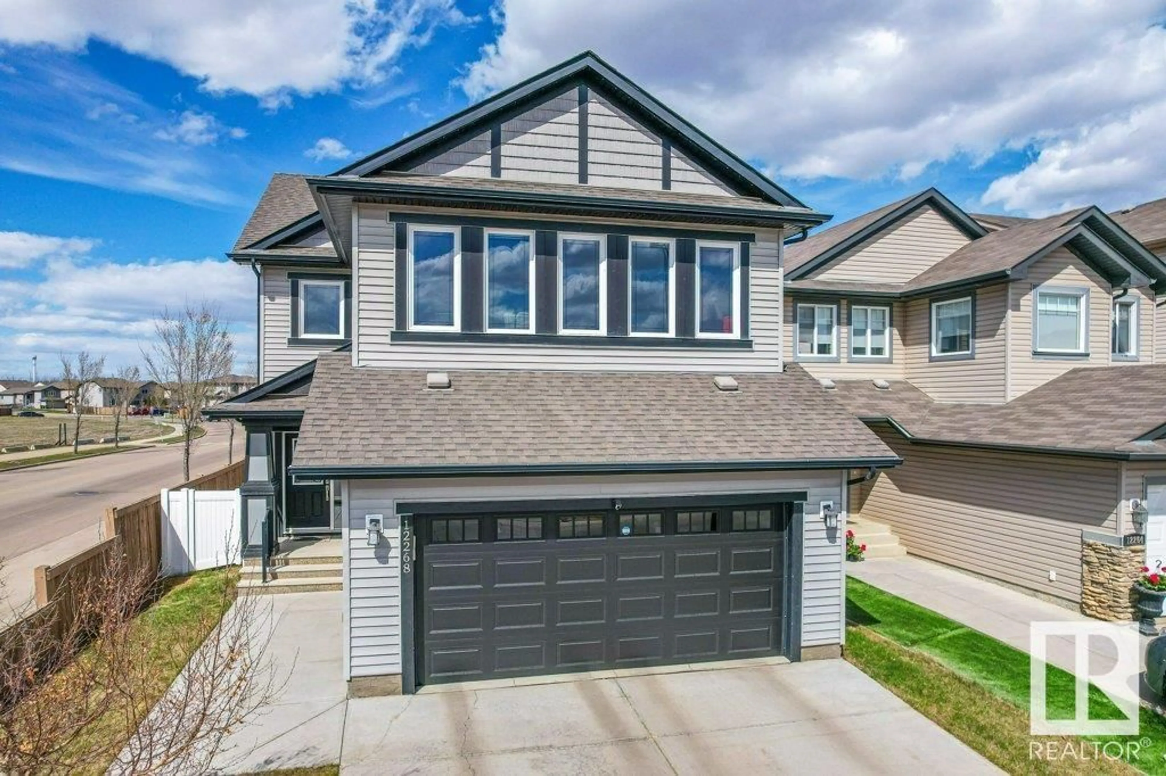 Home with vinyl exterior material, street for NW - 12268 168 AV, Edmonton Alberta T5X0J1