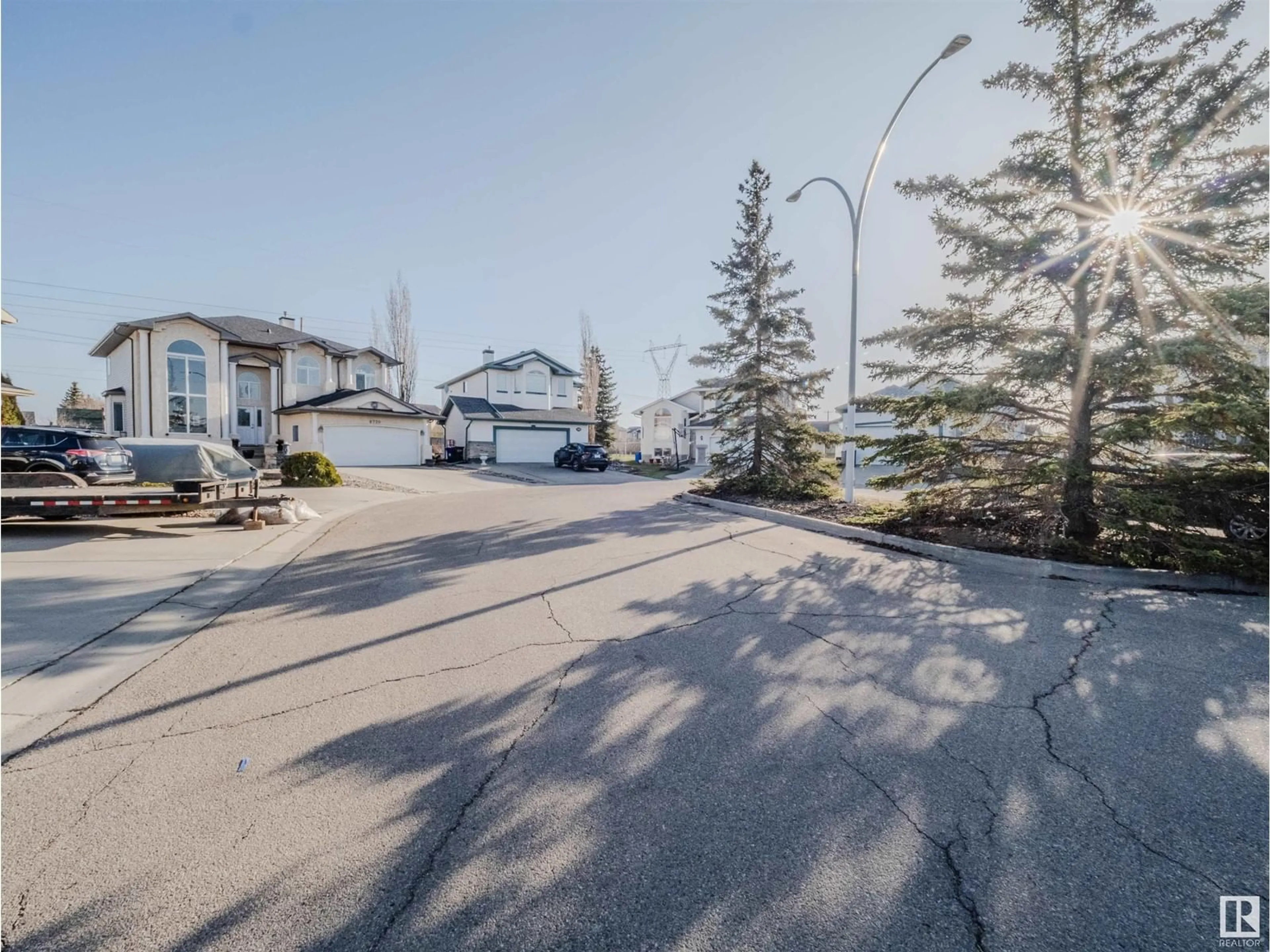 A pic from outside/outdoor area/front of a property/back of a property/a pic from drone, street for 8720 163 AV, Edmonton Alberta T5X3K5