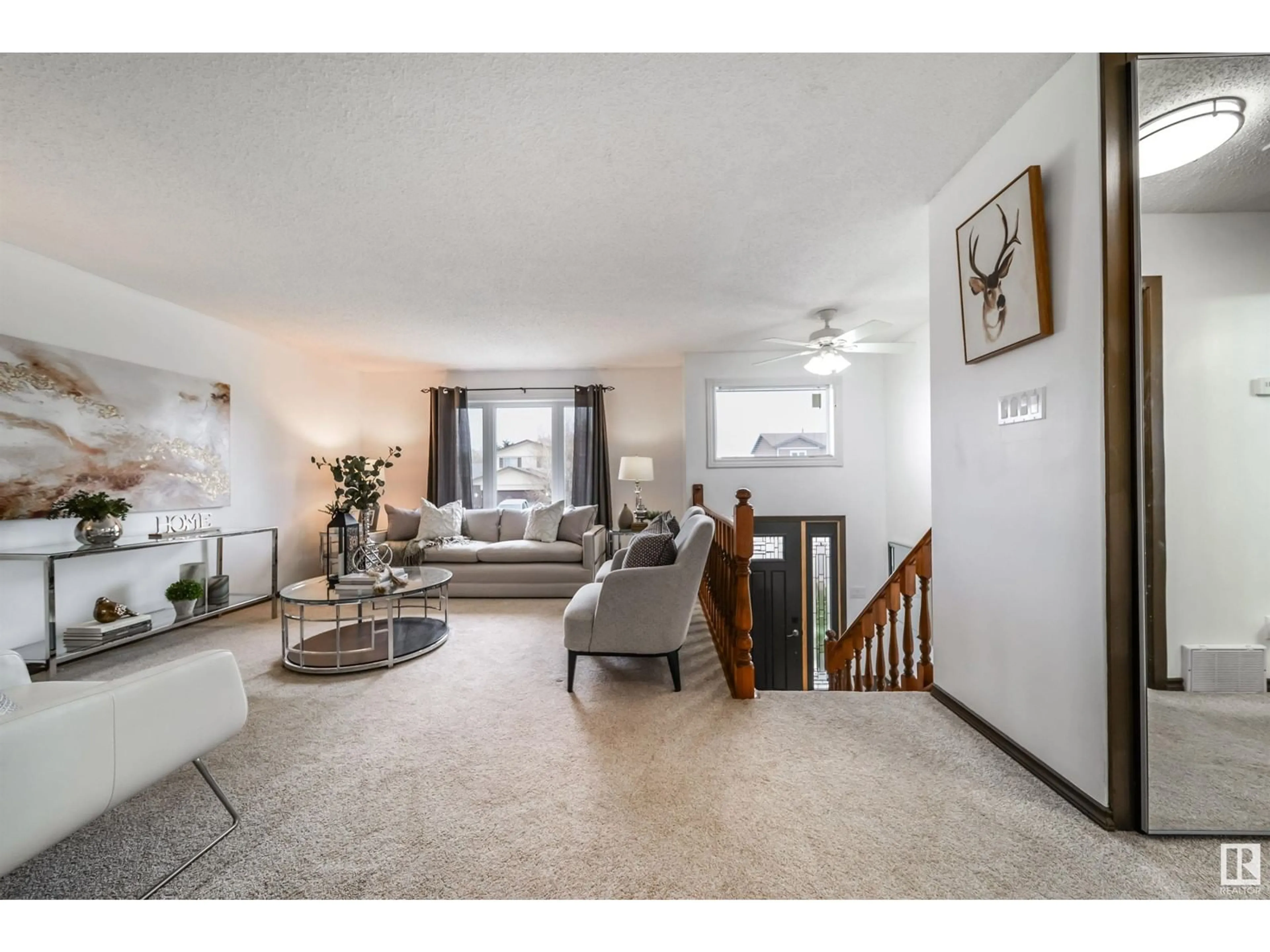 Living room with furniture, unknown for 3328 145 AV, Edmonton Alberta T5Y2E5