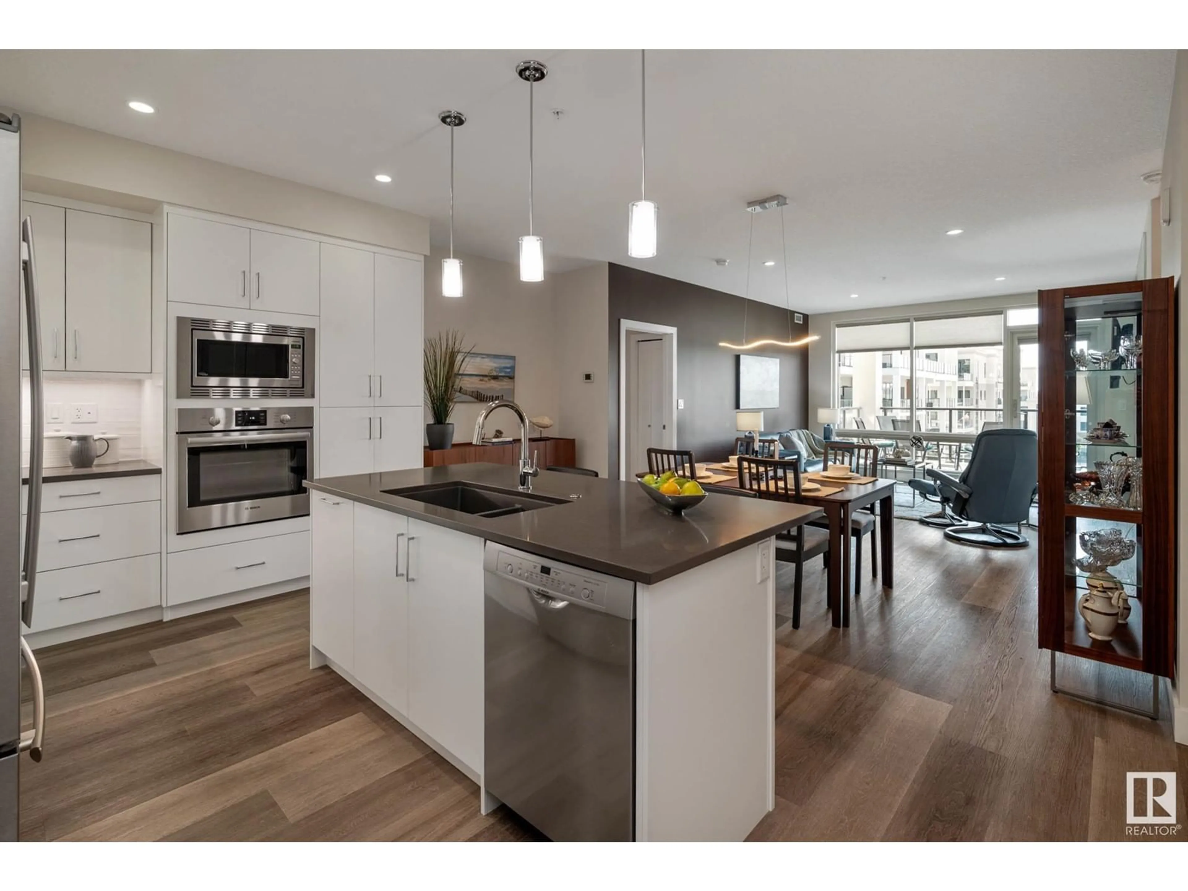 Open concept kitchen, wood/laminate floor for 200 - 838 BELLEROSE DR, St. Albert Alberta T8N7P7