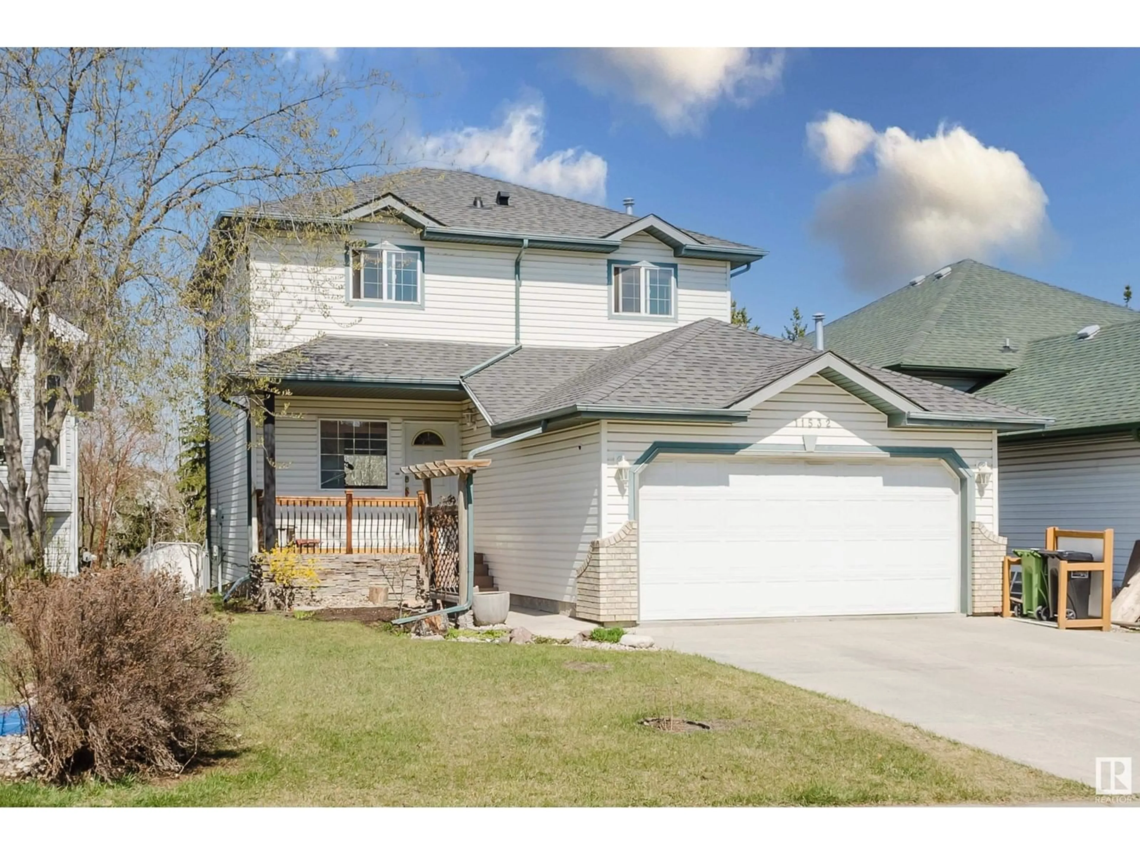 Home with vinyl exterior material, street for 11532 170 AV, Edmonton Alberta T5X5Z4