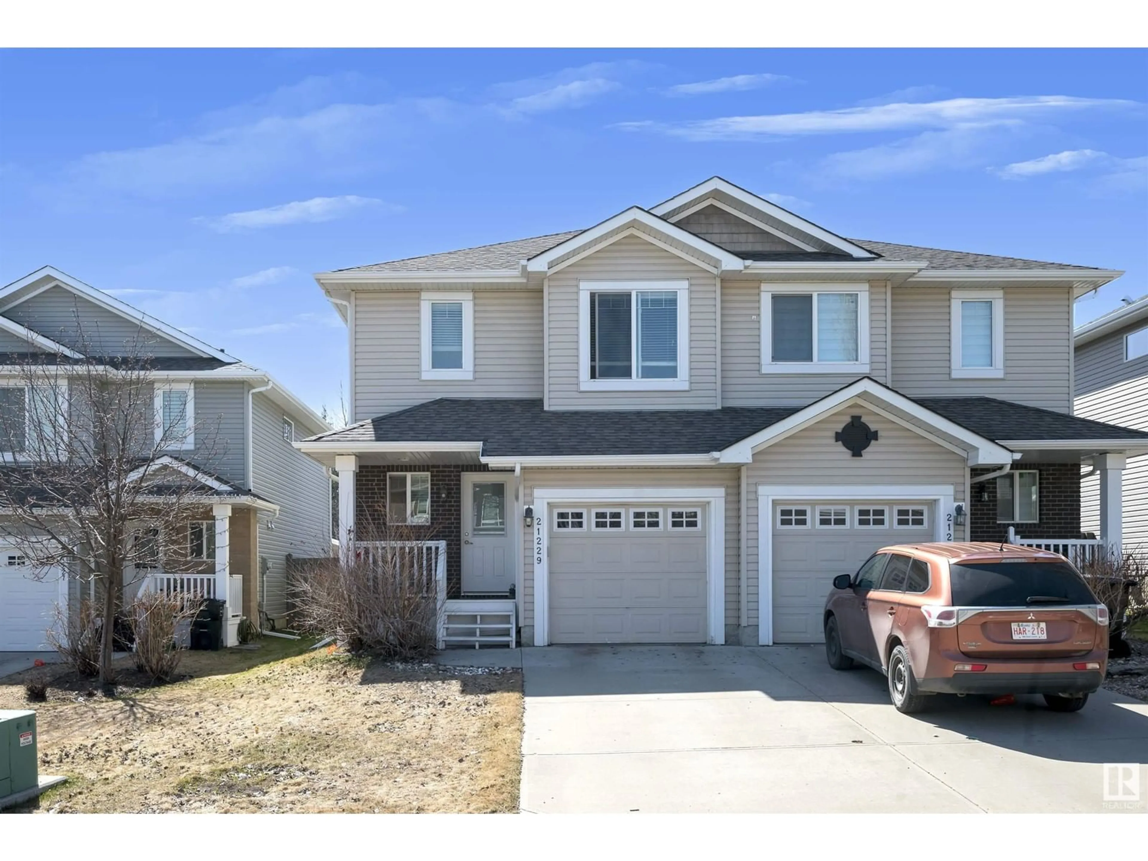 Home with vinyl exterior material, street for 21229 45A AV, Edmonton Alberta T6M0G8