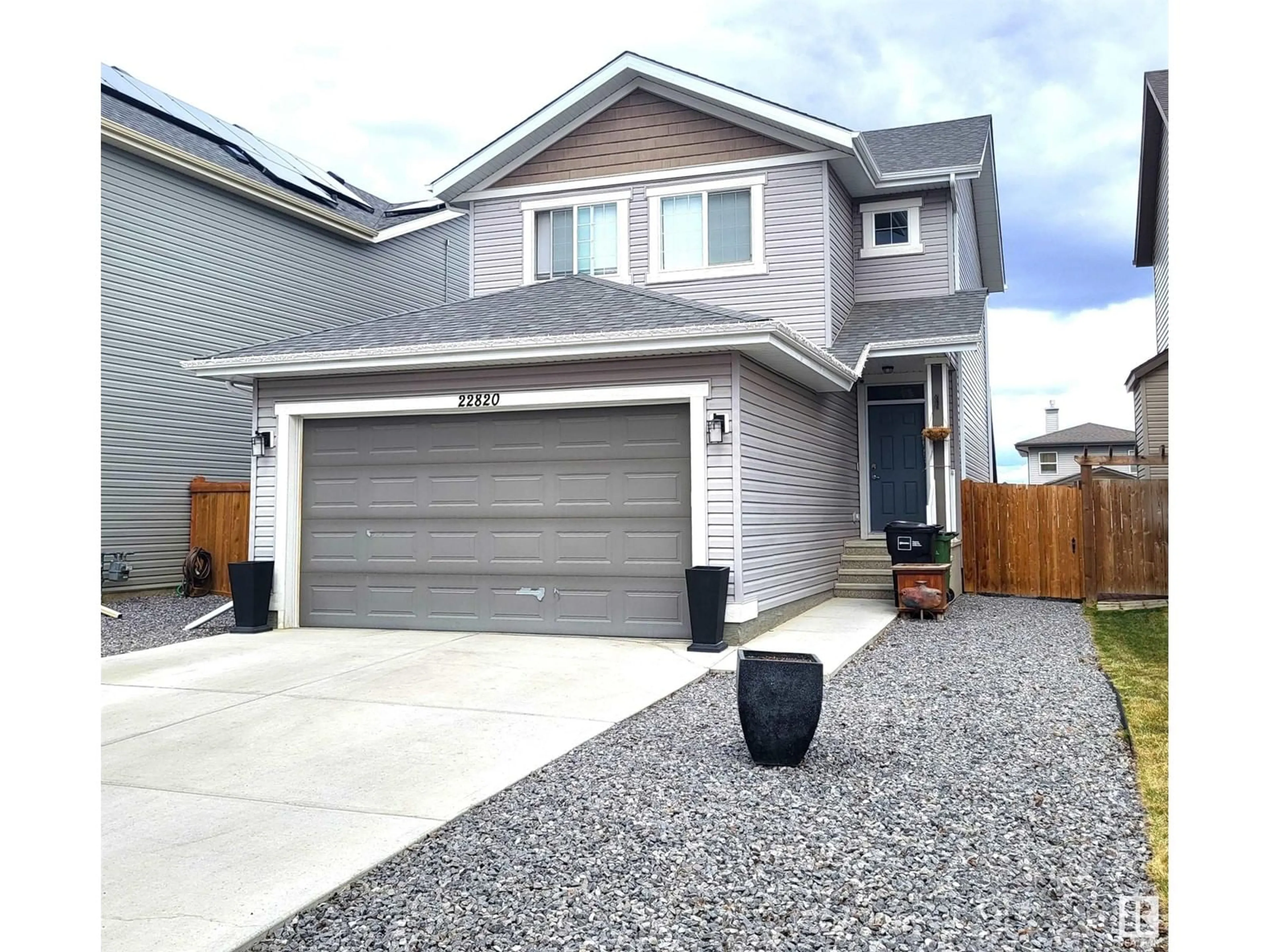 Home with vinyl exterior material, street for NW - 22820 94B AV, Edmonton Alberta T5T7B3