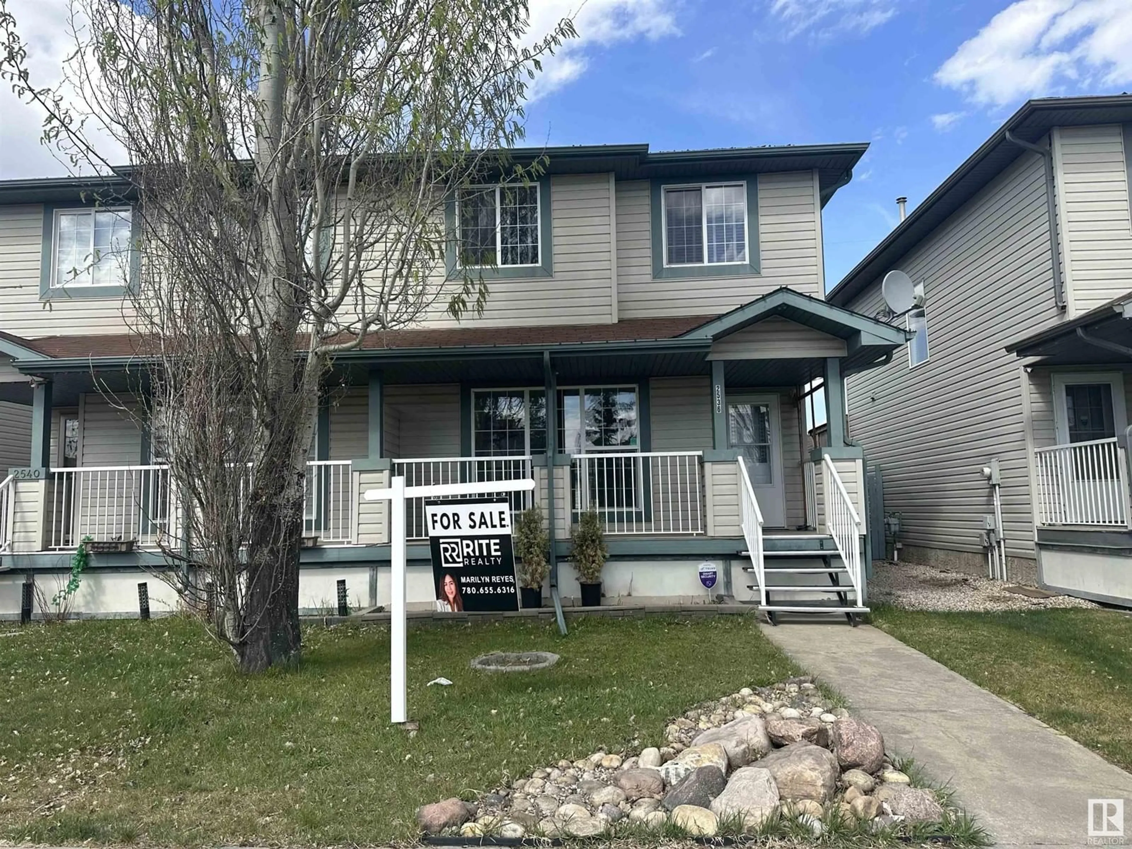 Home with vinyl exterior material, street for 2536 30 AV, Edmonton Alberta T6T2A1