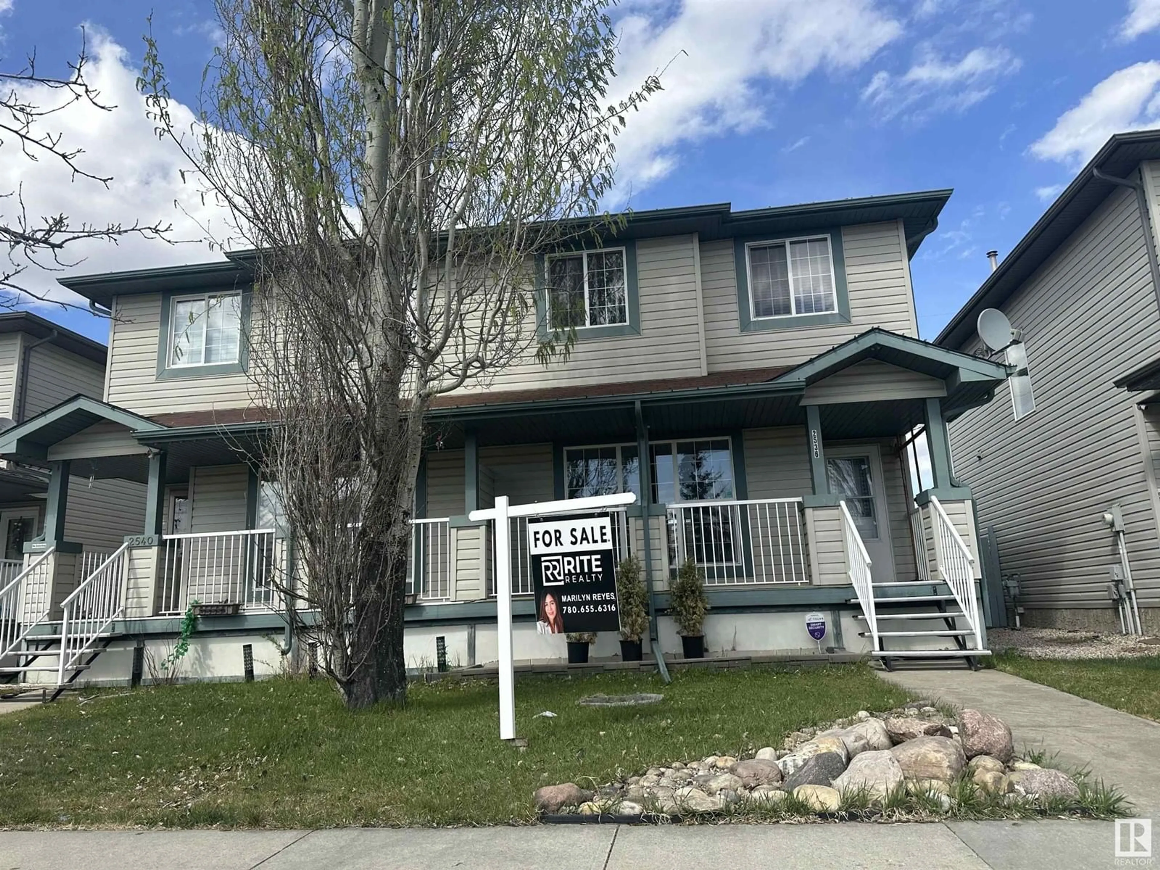 Home with vinyl exterior material, street for 2536 30 AV, Edmonton Alberta T6T2A1