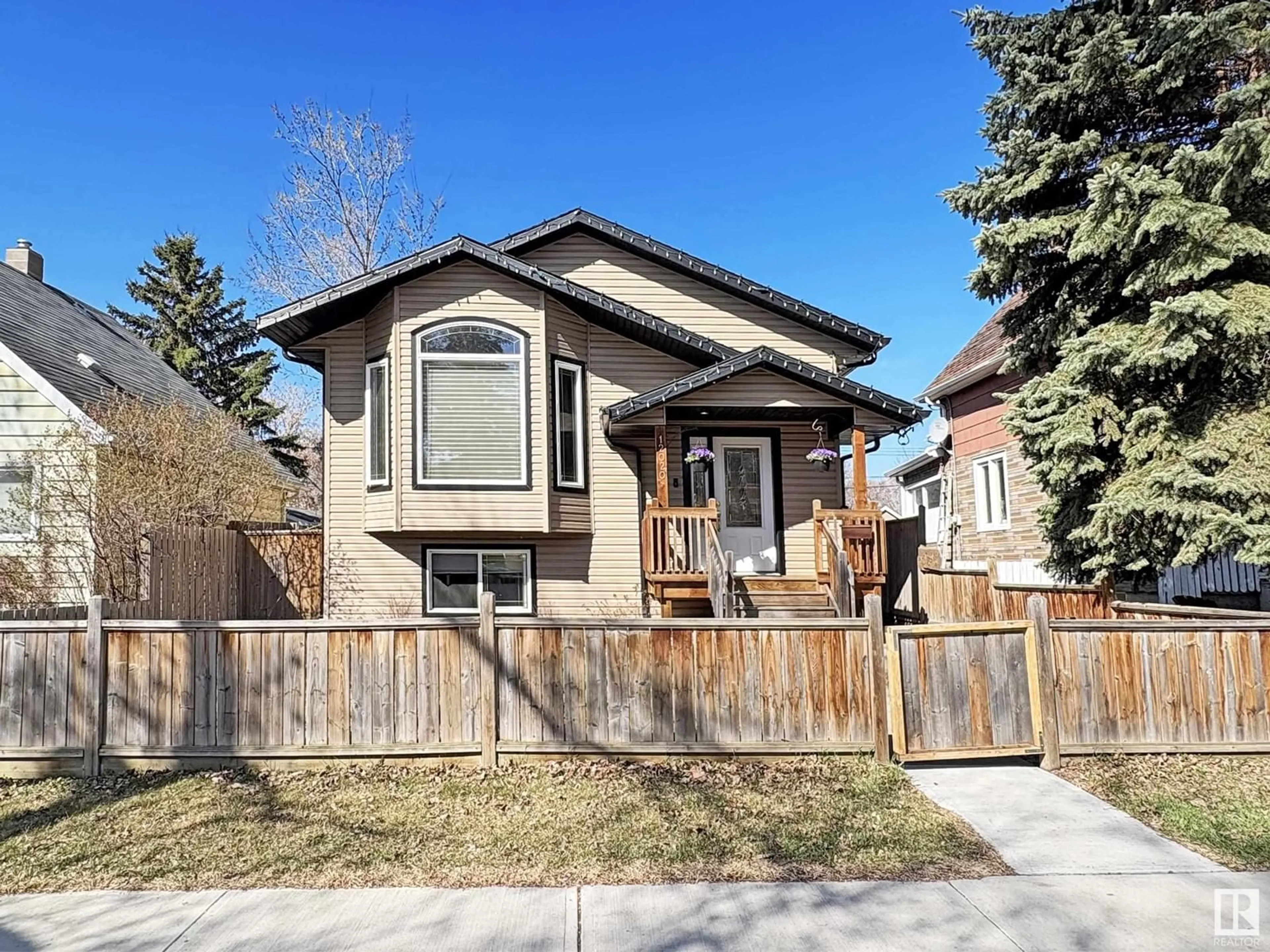 Home with vinyl exterior material, street for NW - 12020 95A ST, Edmonton Alberta T5G1R7