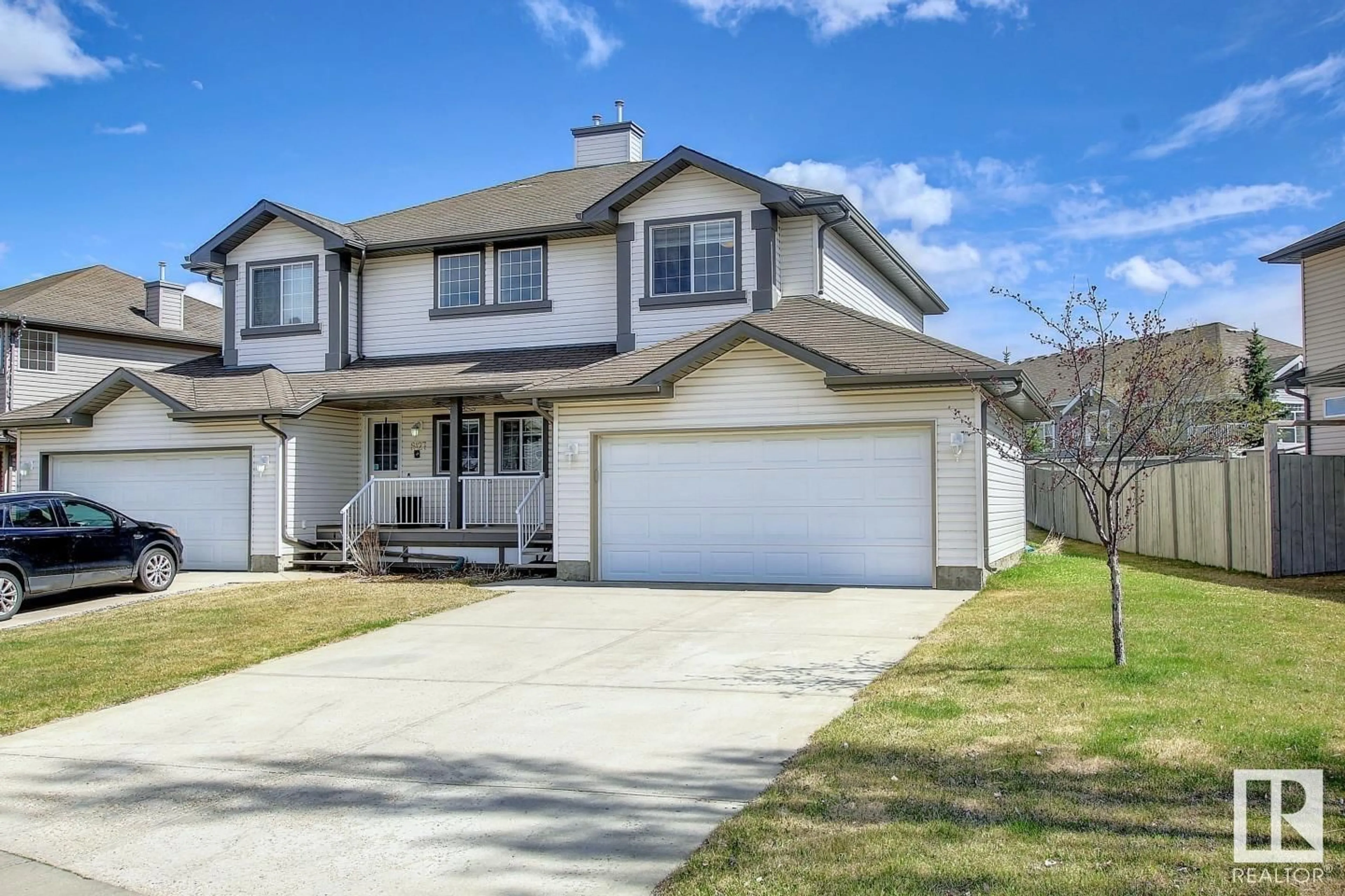 Home with vinyl exterior material, street for 8129 7 AV, Edmonton Alberta T6X1L9