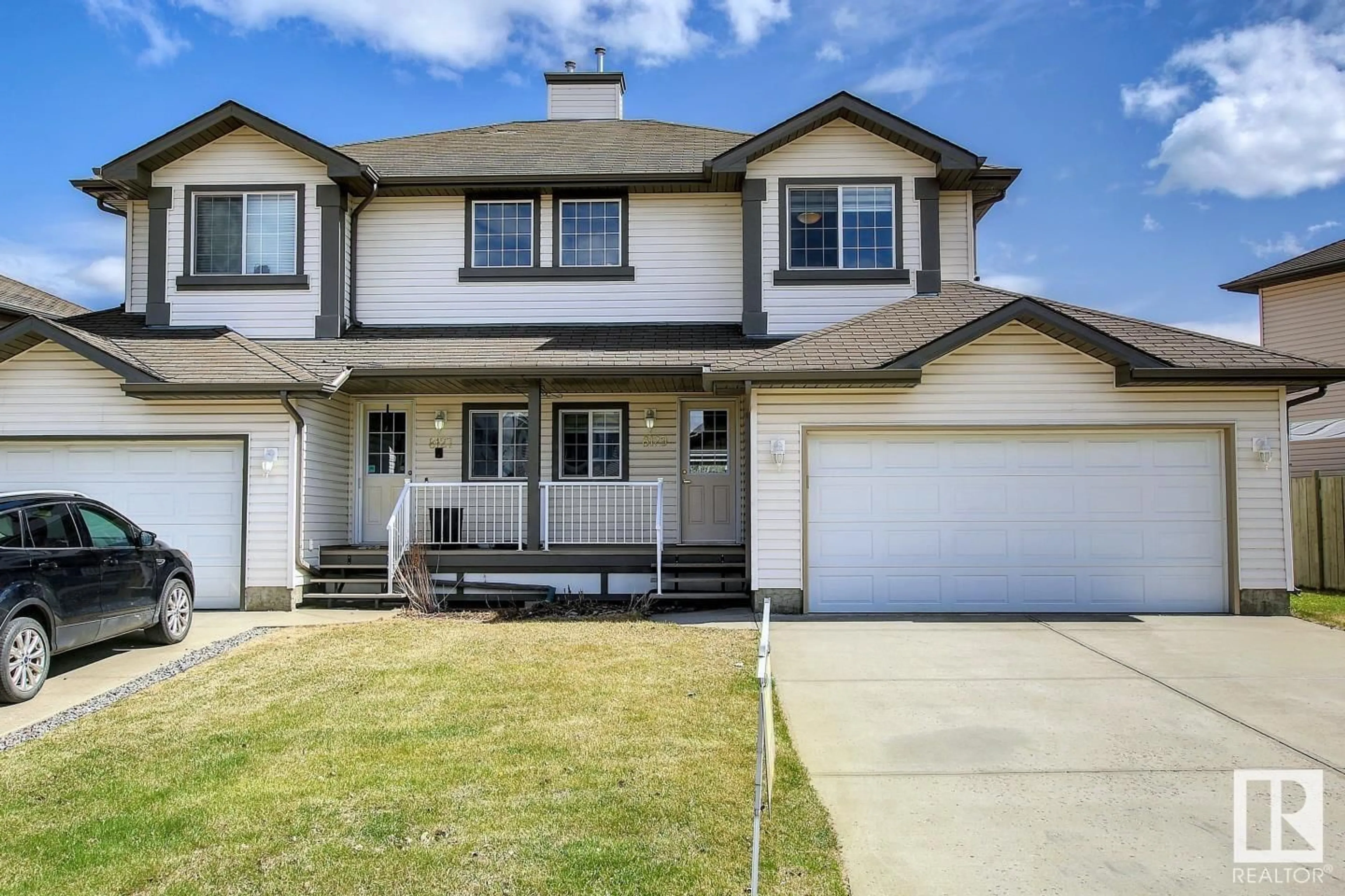 Home with vinyl exterior material, street for 8129 7 AV, Edmonton Alberta T6X1L9