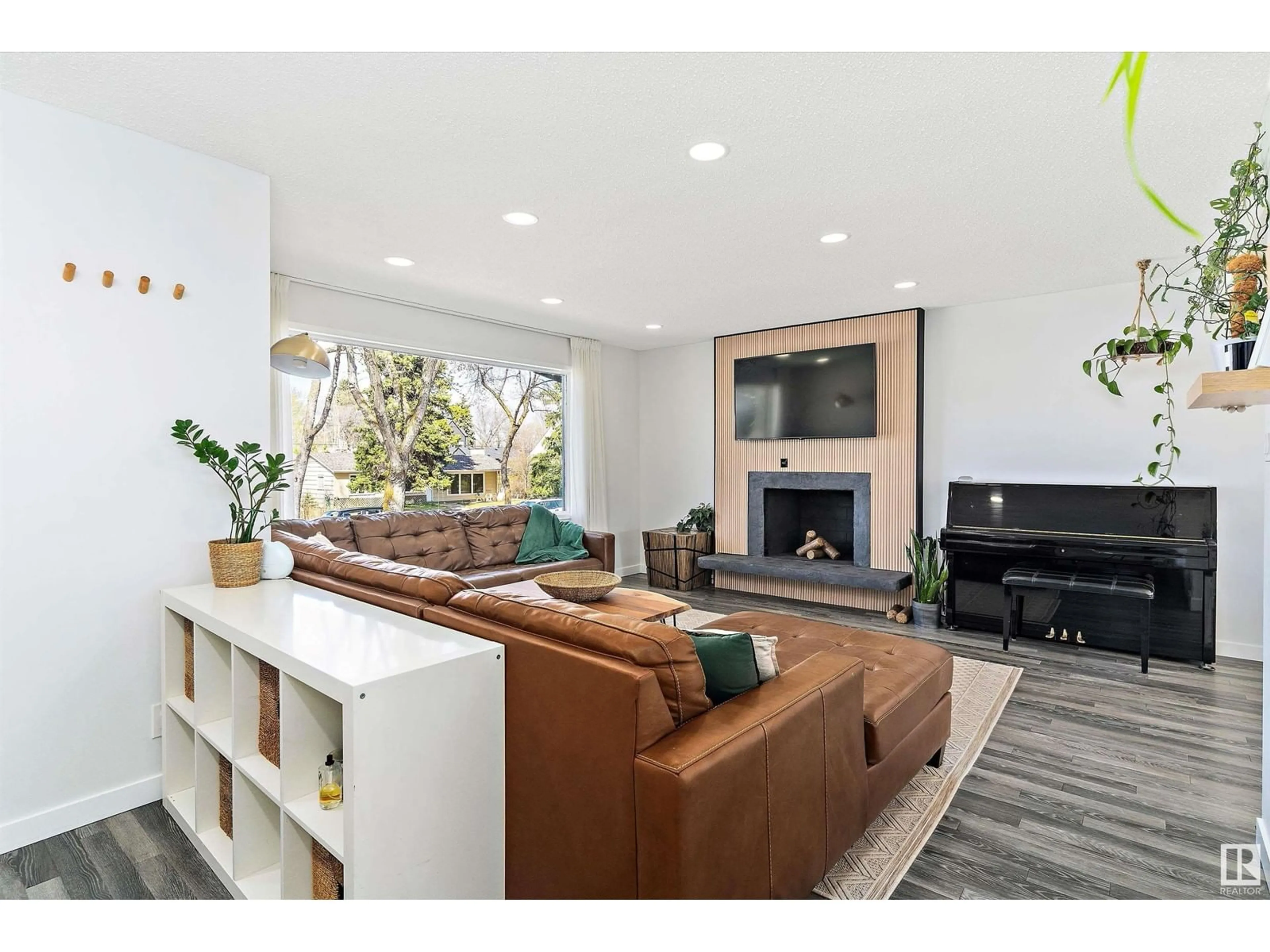 Living room with furniture, unknown for 7711 80 AV, Edmonton Alberta T6C0S3