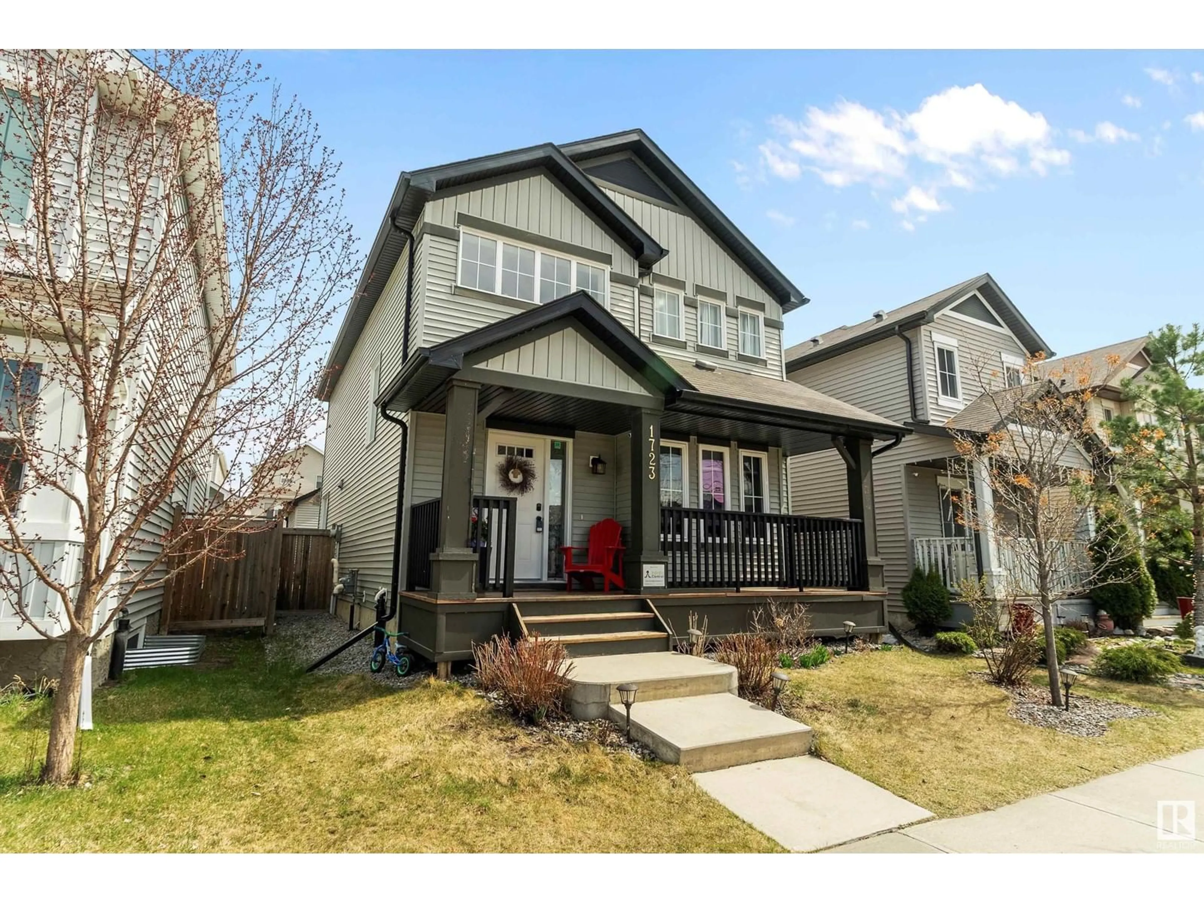 Home with vinyl exterior material, street for SW - 1723 56 ST, Edmonton Alberta T6X0P6