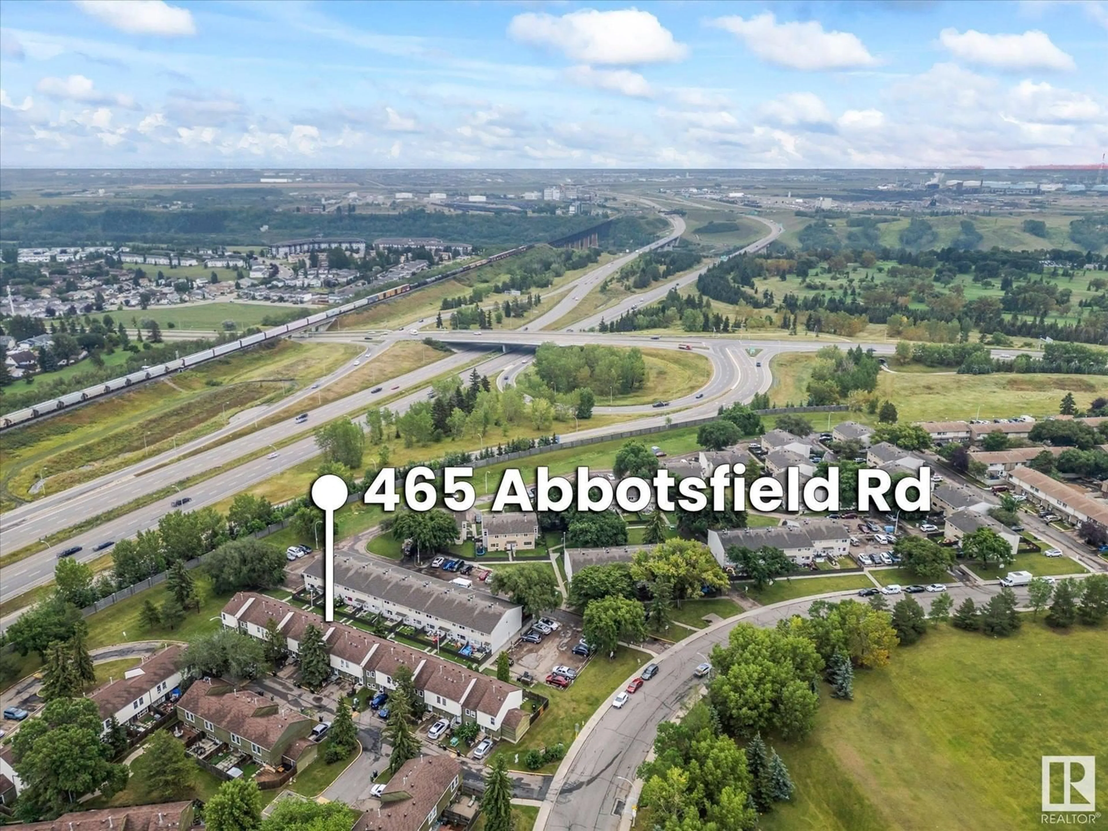 A pic from outside/outdoor area/front of a property/back of a property/a pic from drone, street for 465 ABBOTTSFIELD RD, Edmonton Alberta T5W4R3