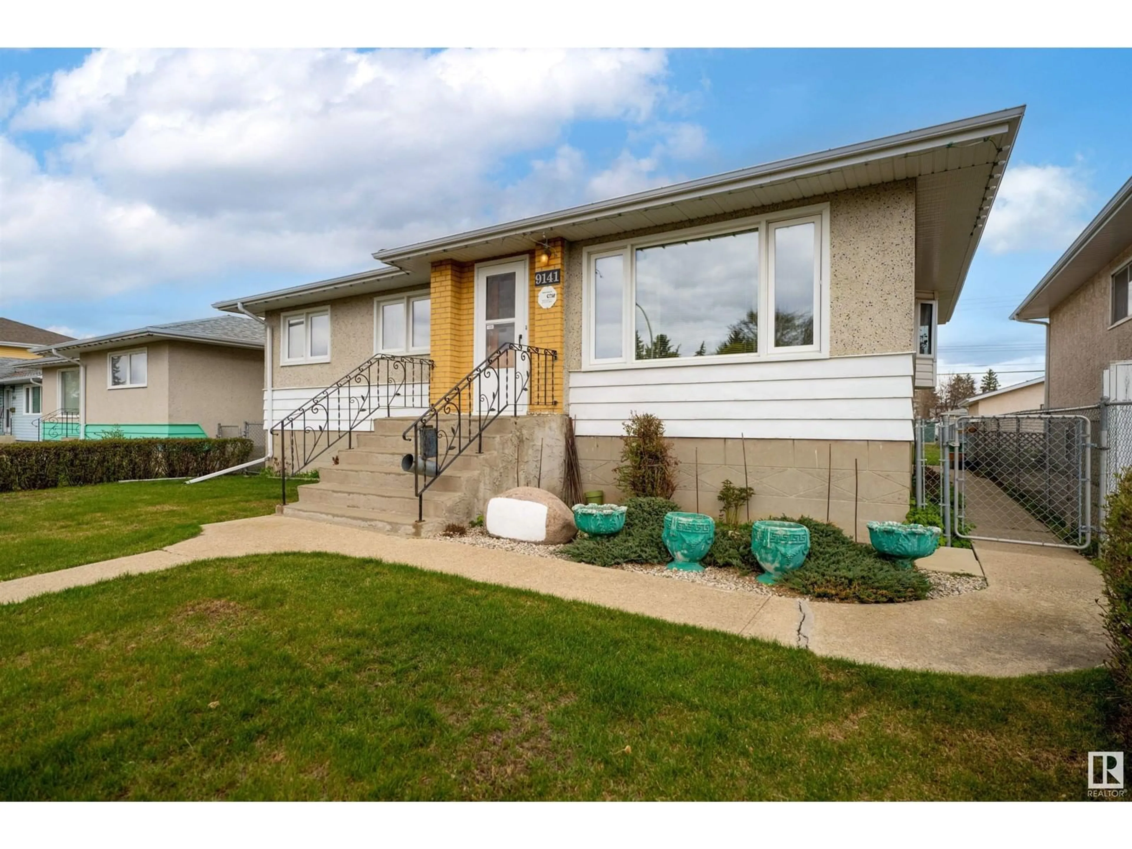 Home with vinyl exterior material, street for NW - 9141 152 ST, Edmonton Alberta T5R1M5