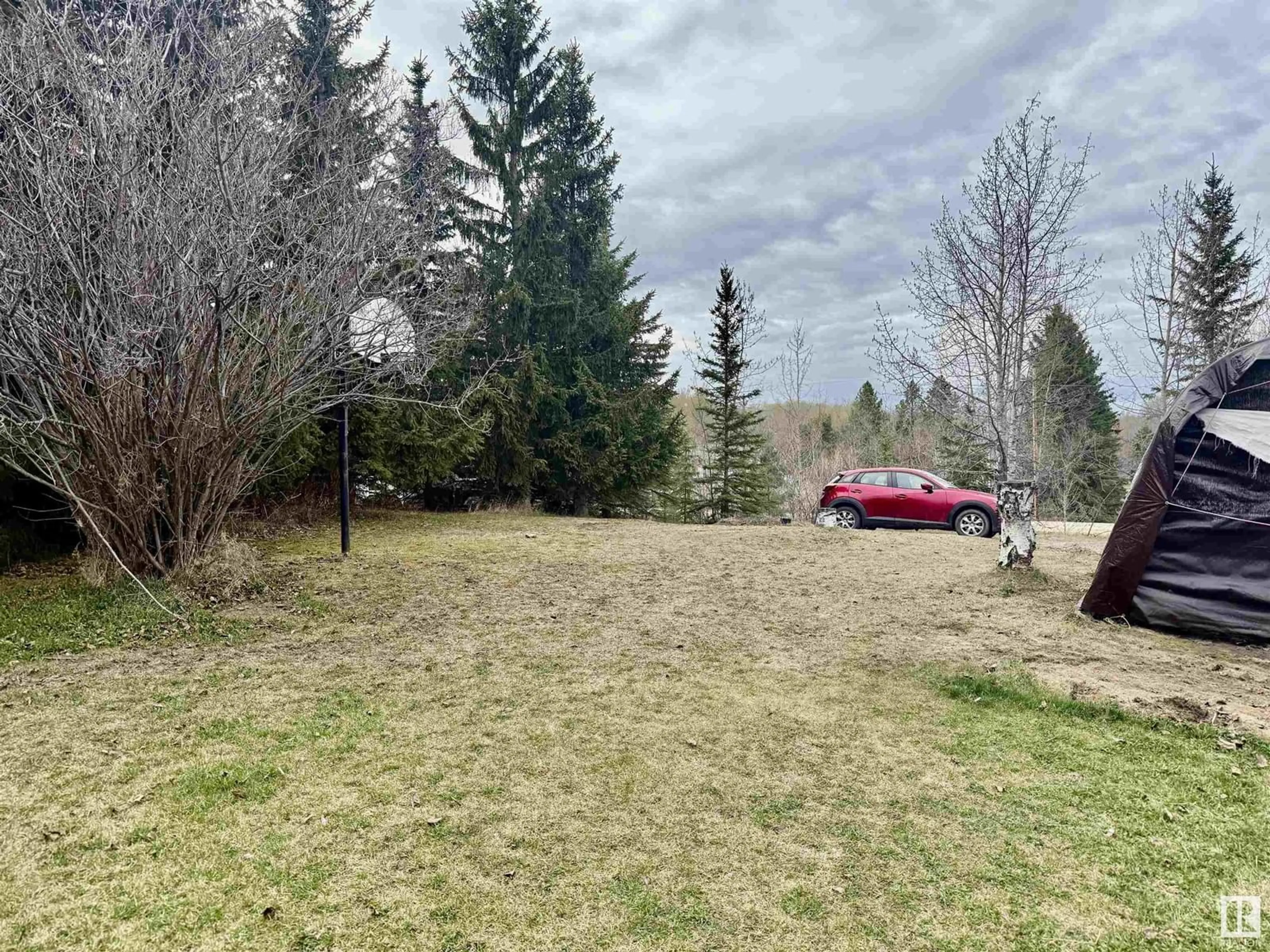 A pic from outside/outdoor area/front of a property/back of a property/a pic from drone, forest/trees view for 53304 - 121 RGE ROAD 30, Rural Parkland County Alberta T0E0H0
