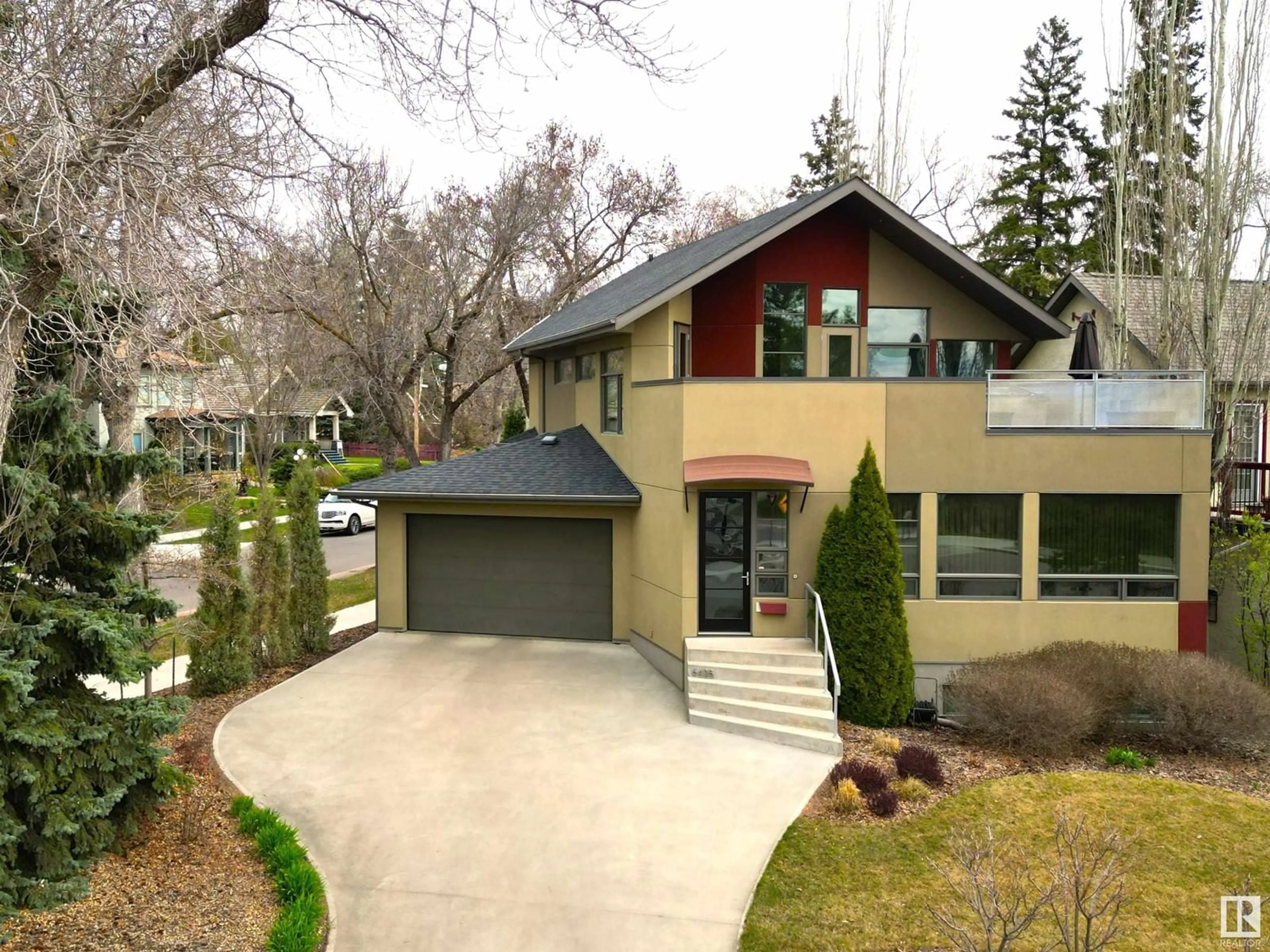 Home with vinyl exterior material, street for 6428 ADA BV, Edmonton Alberta T5W4P2