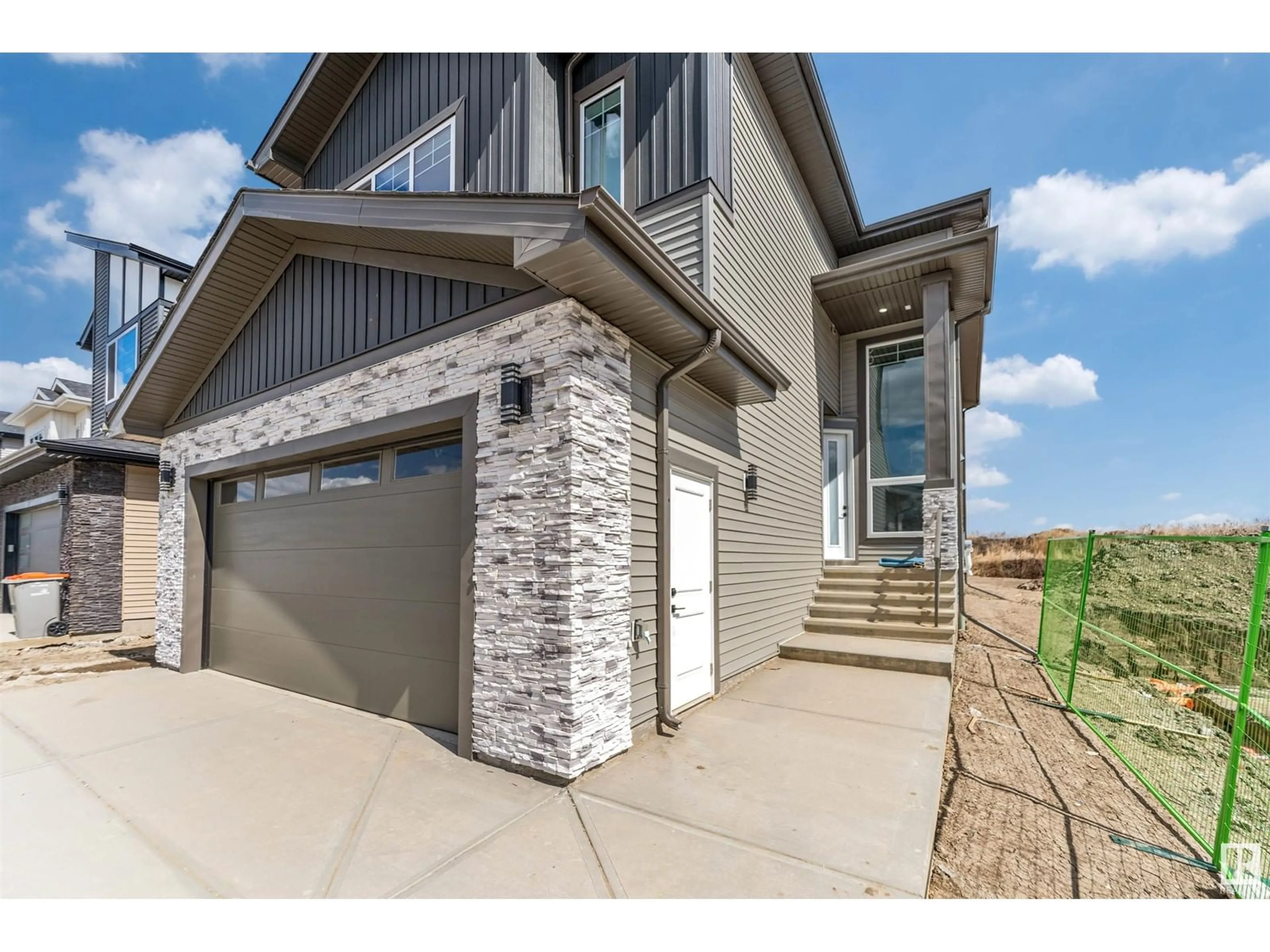 Home with brick exterior material, street for NE - 6245 19 ST, Rural Leduc County Alberta T4X3C8