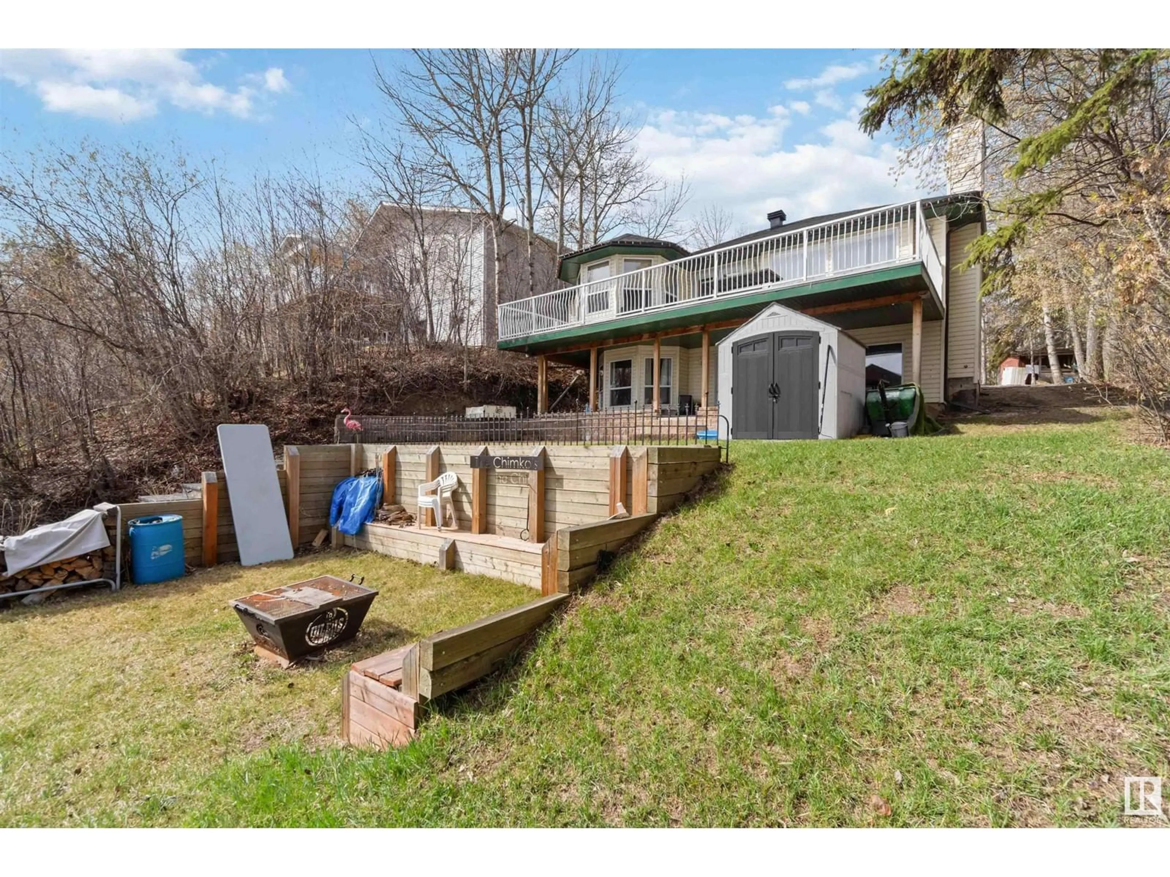 A pic from outside/outdoor area/front of a property/back of a property/a pic from drone, water/lake/river/ocean view for 109 - 3215 TWP RD 574, Rural Lac Ste. Anne County Alberta T0G1L2