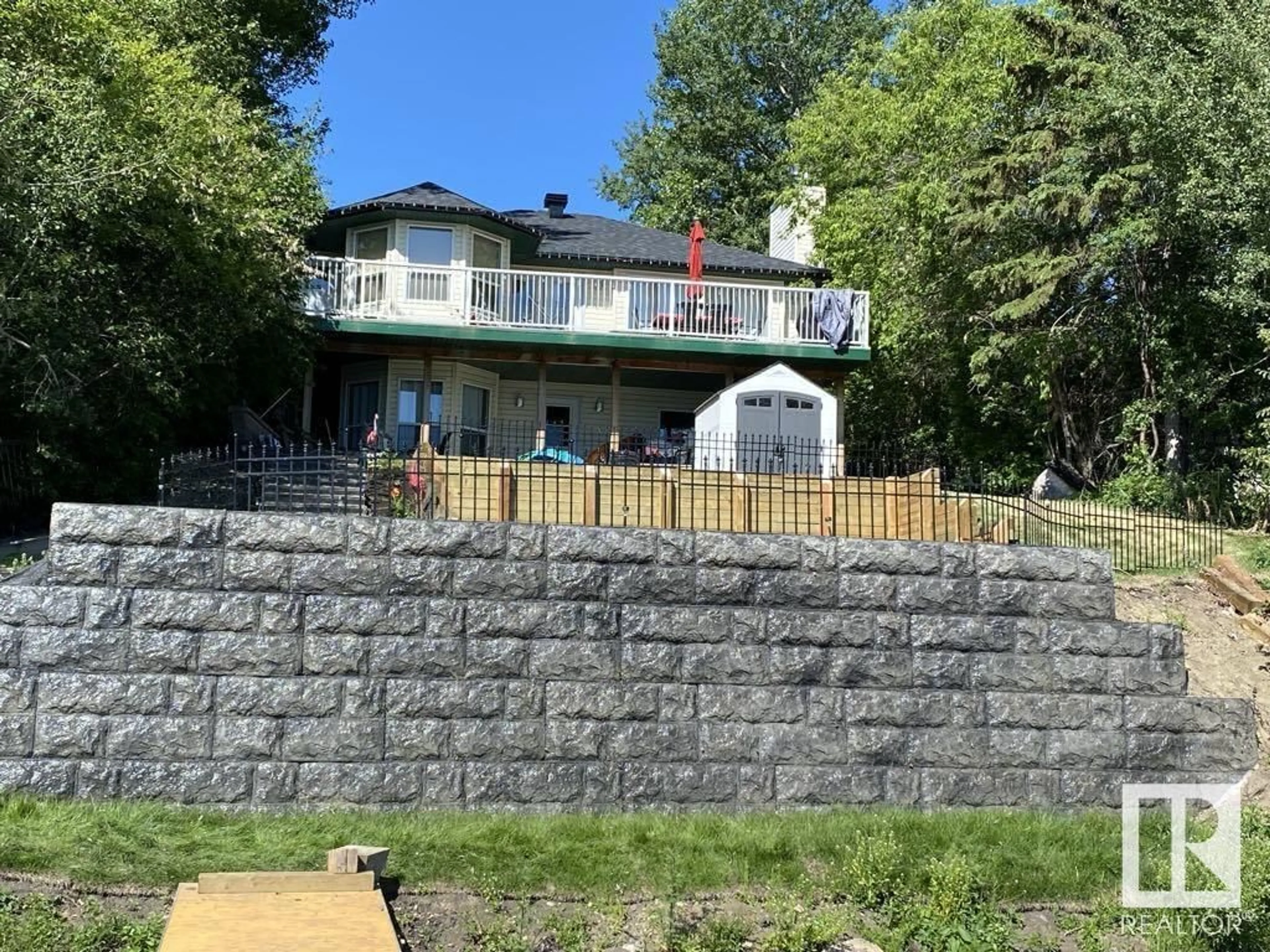 A pic from outside/outdoor area/front of a property/back of a property/a pic from drone, unknown for 109 - 3215 TWP RD 574, Rural Lac Ste. Anne County Alberta T0G1L2