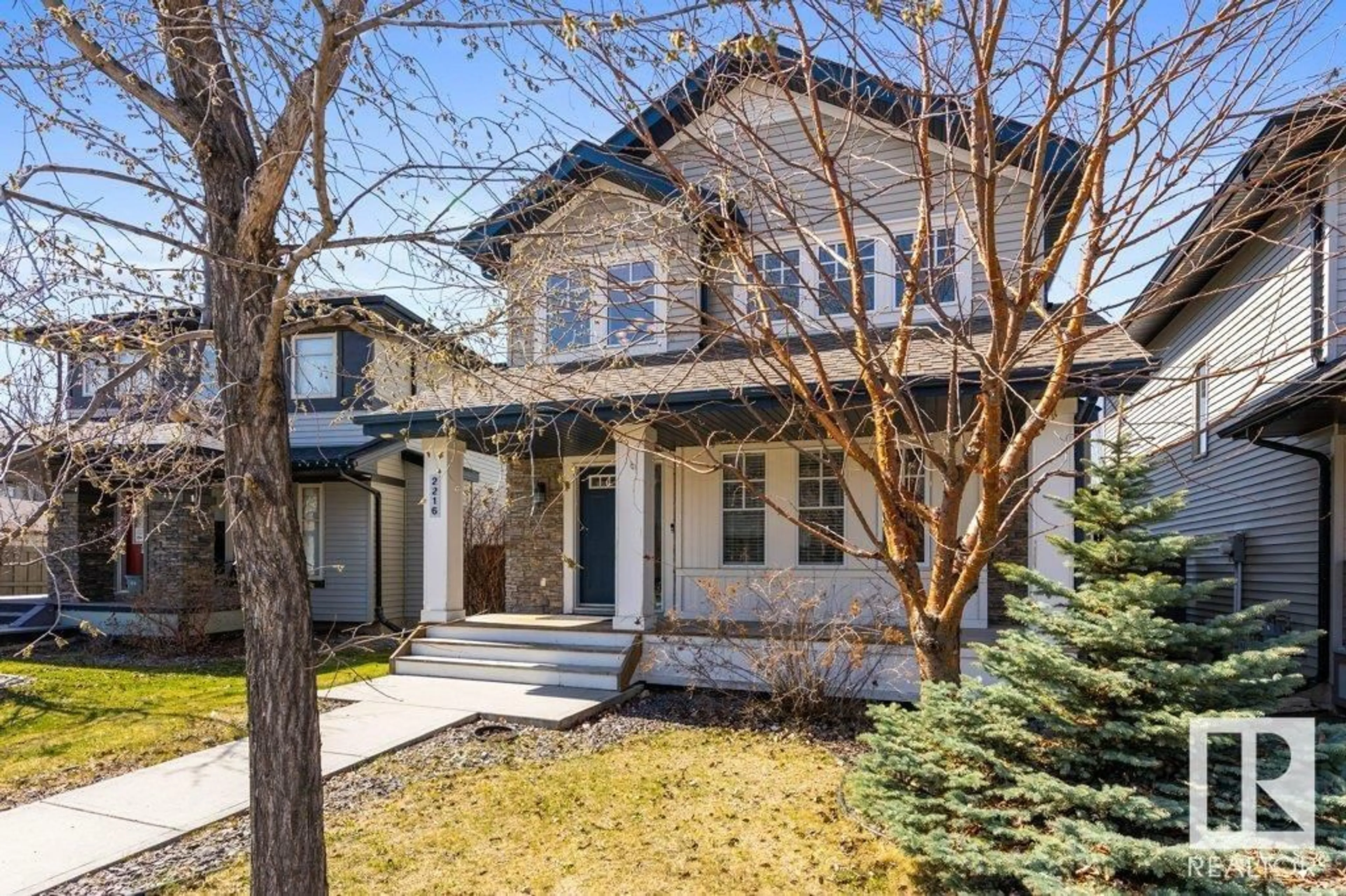 Home with brick exterior material, street for 2216 AUSTIN WY, Edmonton Alberta T6W0L2