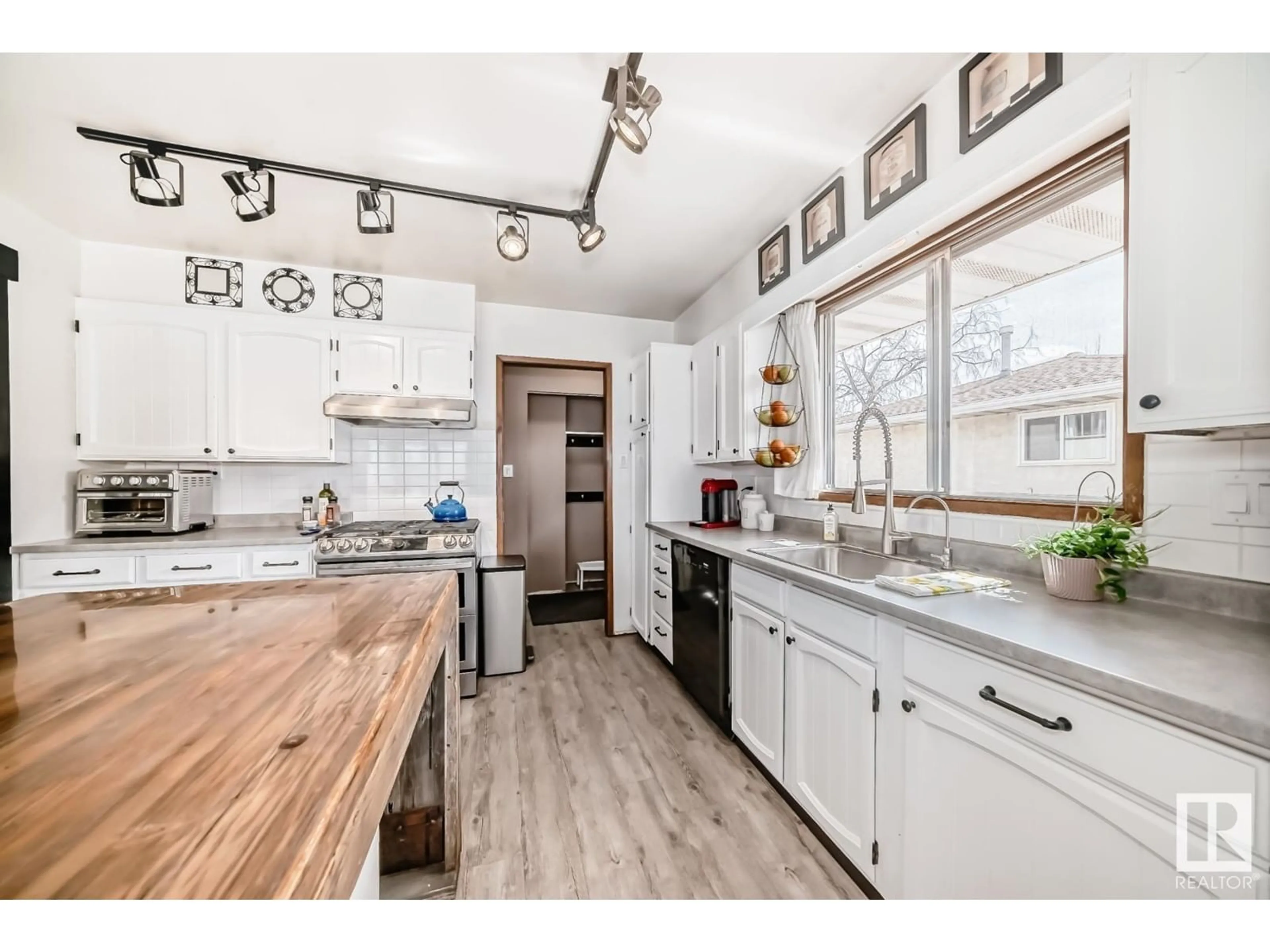 Open concept kitchen, unknown for 10411 31 AV, Edmonton Alberta T6J3K2
