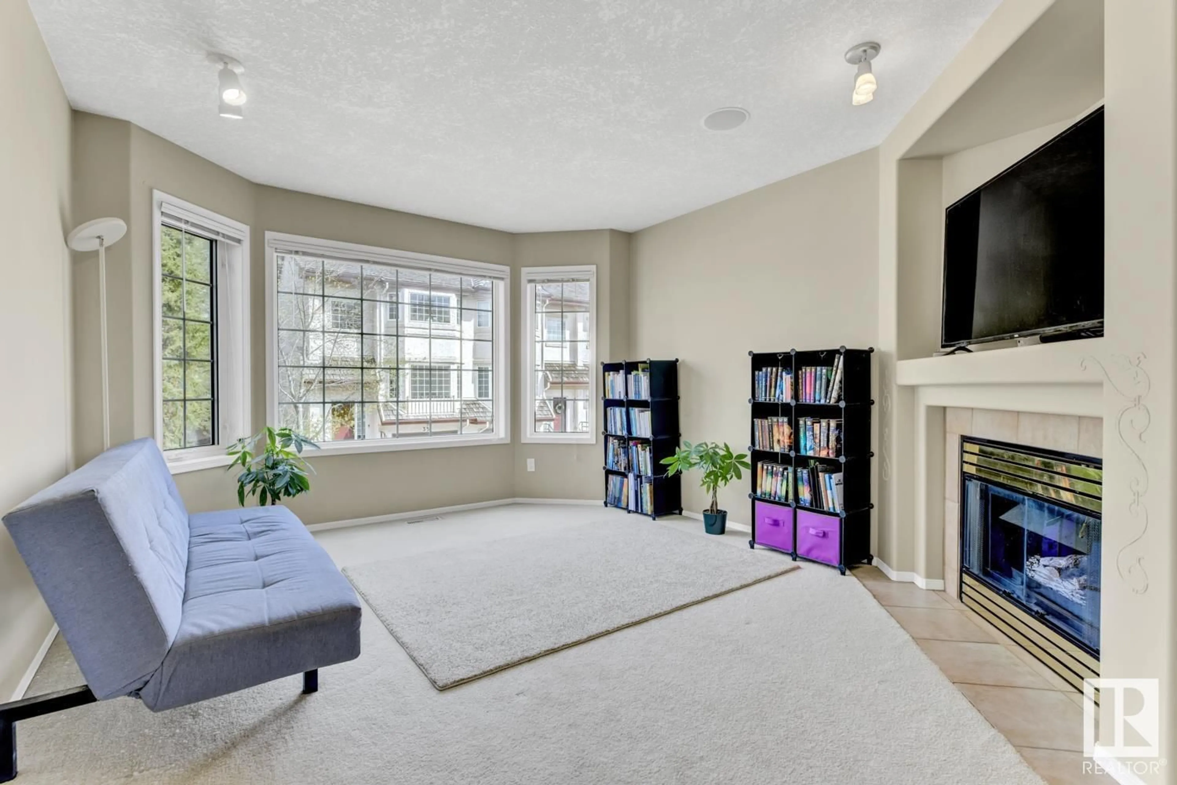 Living room with furniture, unknown for #18 - 1237 CARTER CREST RD, Edmonton Alberta T6R2R2