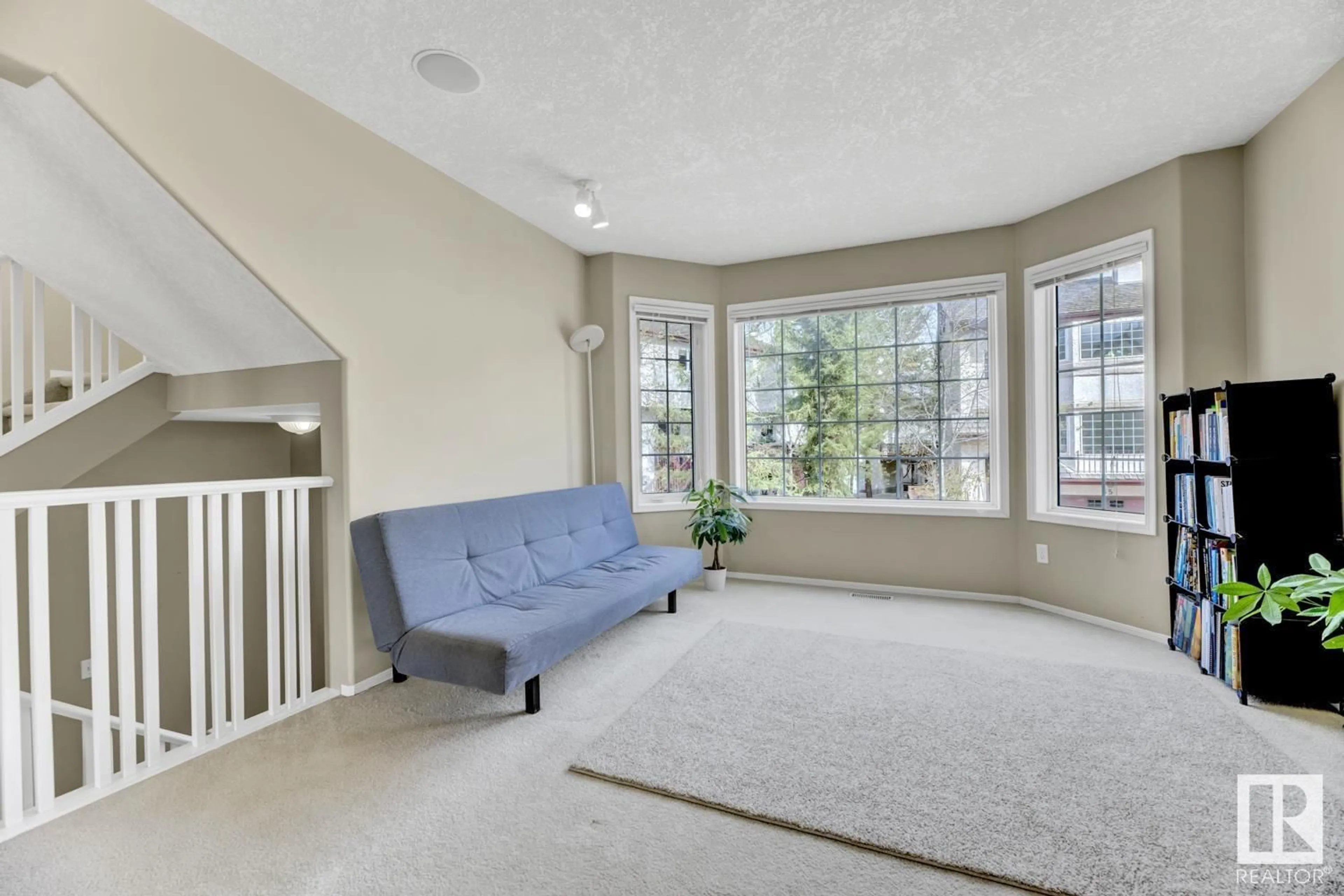 Living room with furniture, unknown for #18 - 1237 CARTER CREST RD, Edmonton Alberta T6R2R2