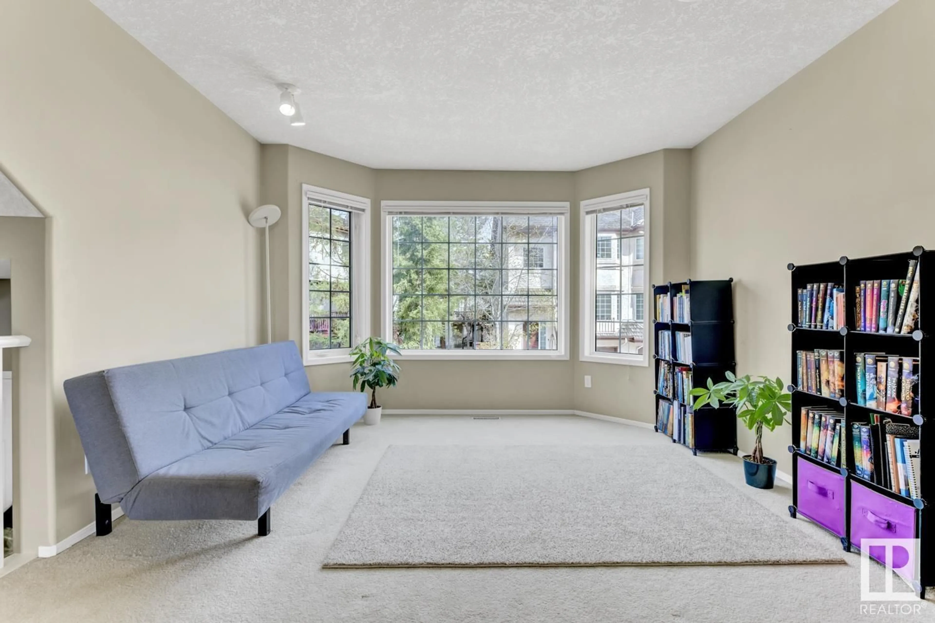 Living room with furniture, unknown for #18 - 1237 CARTER CREST RD, Edmonton Alberta T6R2R2