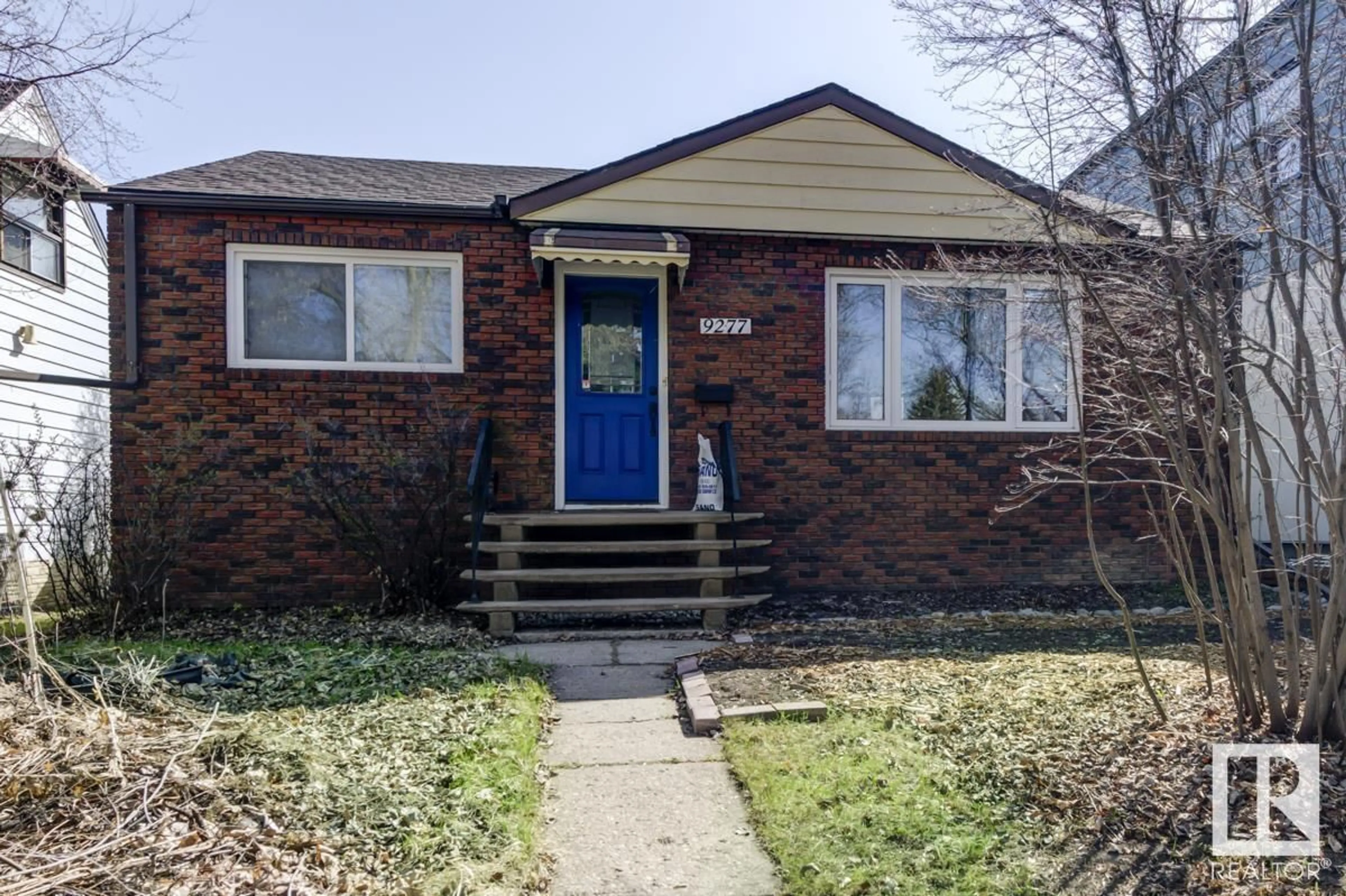 Home with brick exterior material, street for 9277 87 ST, Edmonton Alberta T6C3H7