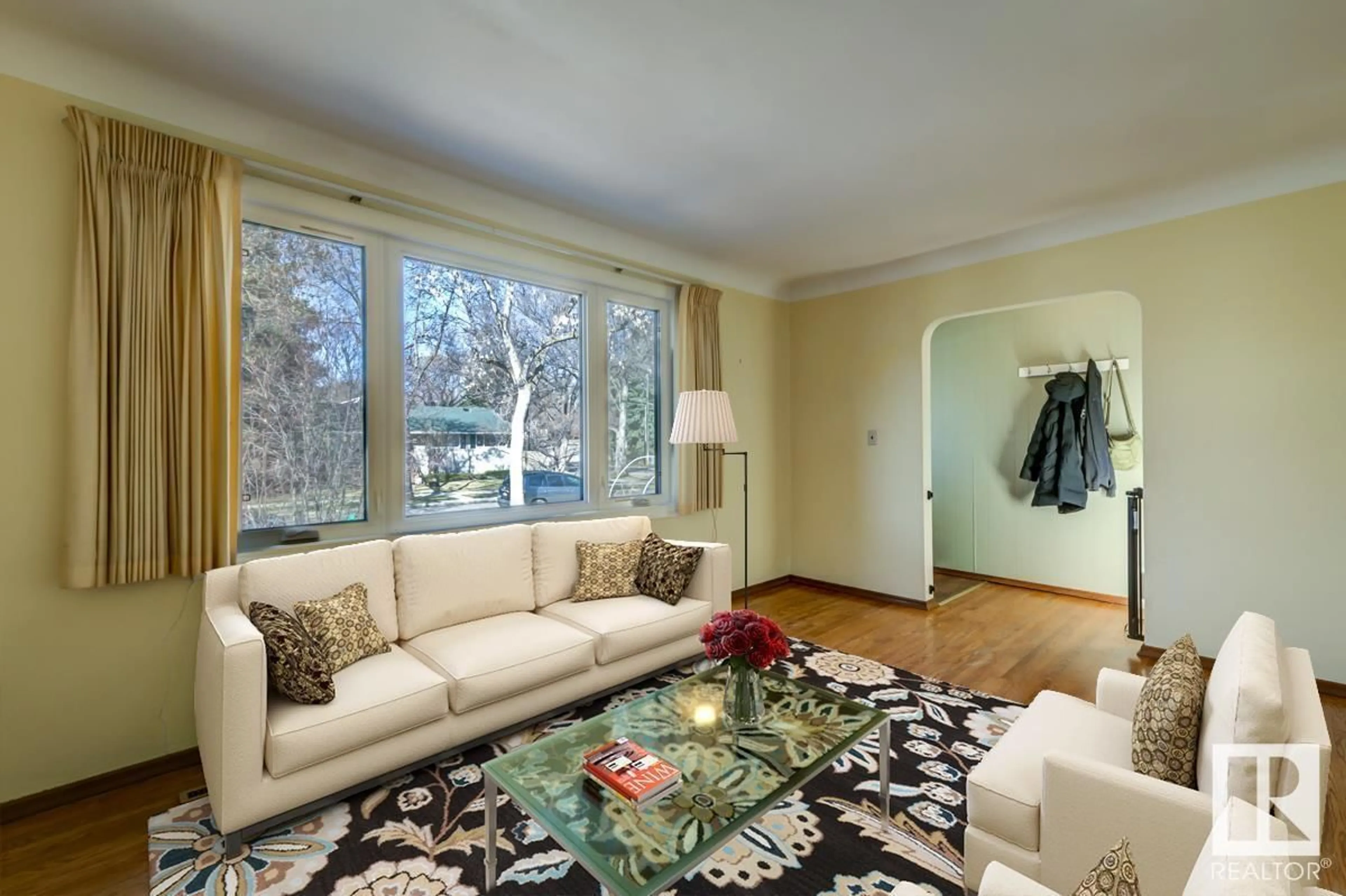 Living room with furniture, carpet floor for 9277 87 ST, Edmonton Alberta T6C3H7