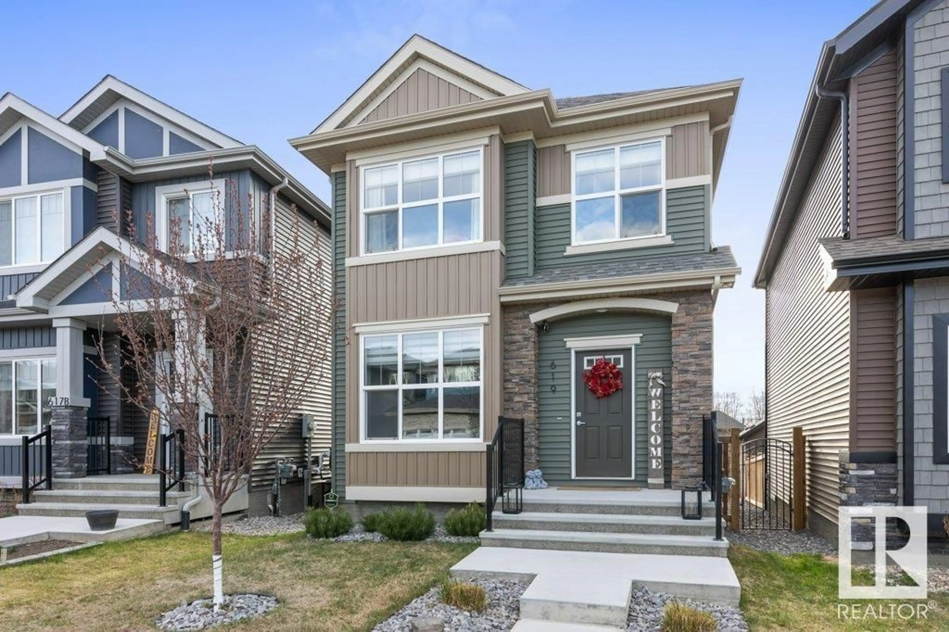 Home with vinyl exterior material, street for 619 MERLIN LANDING LD, Edmonton Alberta T5S0L9