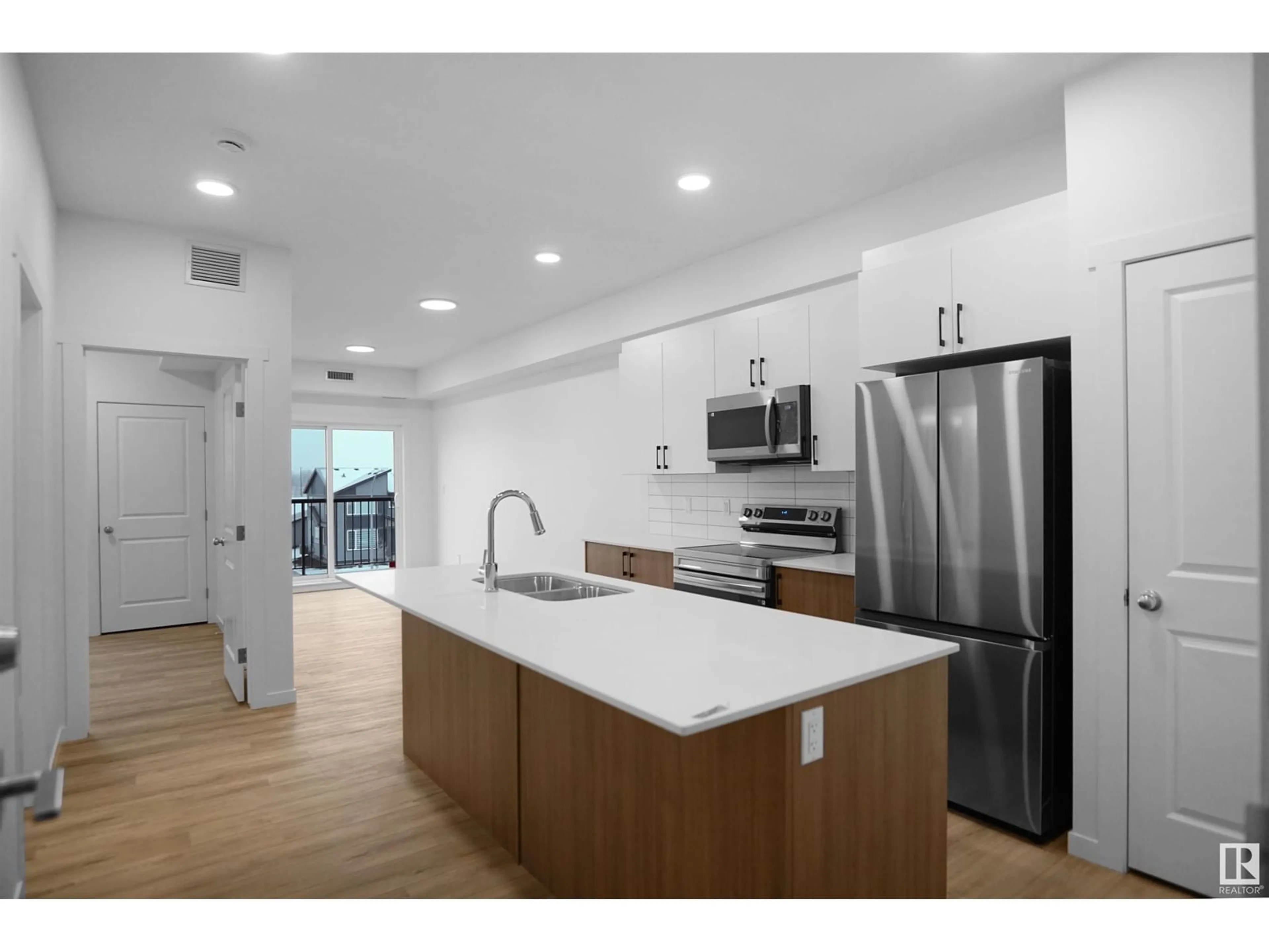 Open concept kitchen, unknown for #101 - 9207 228 ST, Edmonton Alberta T5T7R9