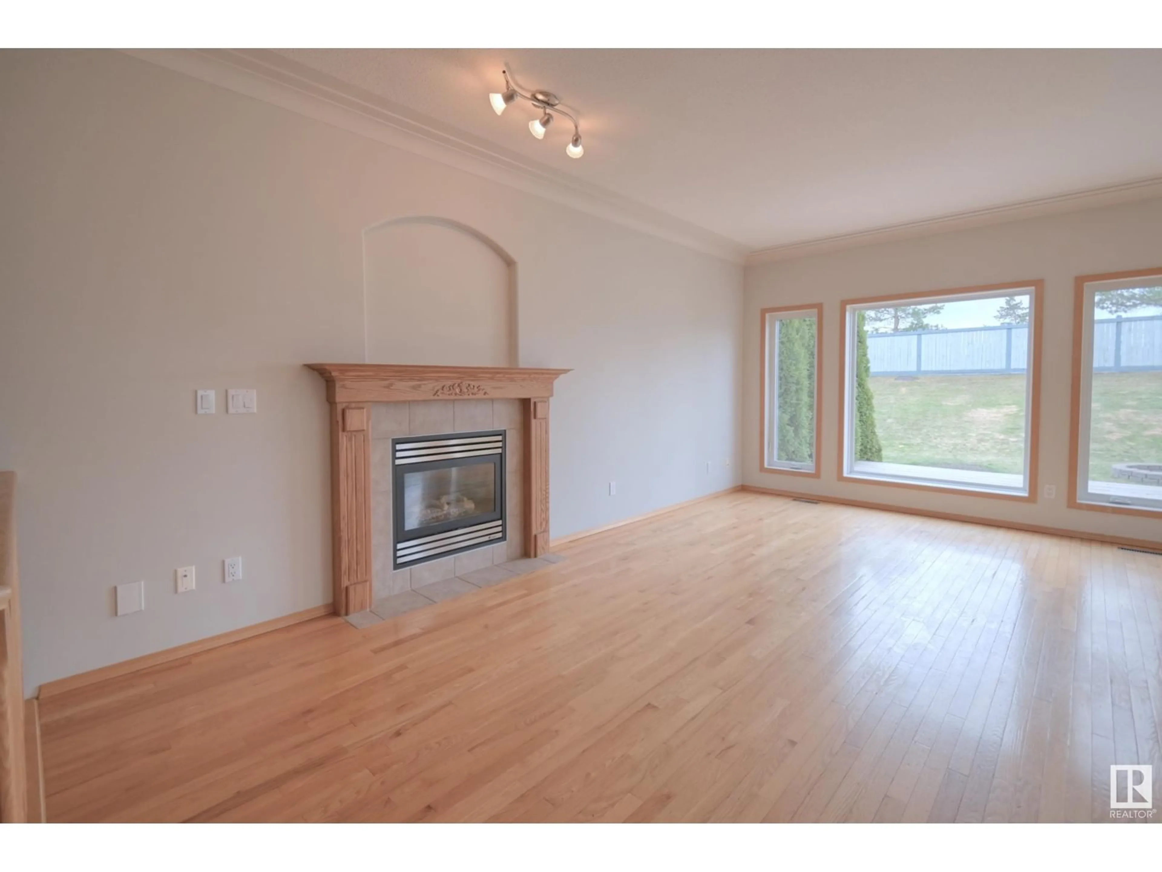 Living room with furniture, wood/laminate floor for 29 DEER PARK CR, Spruce Grove Alberta T7X4J2