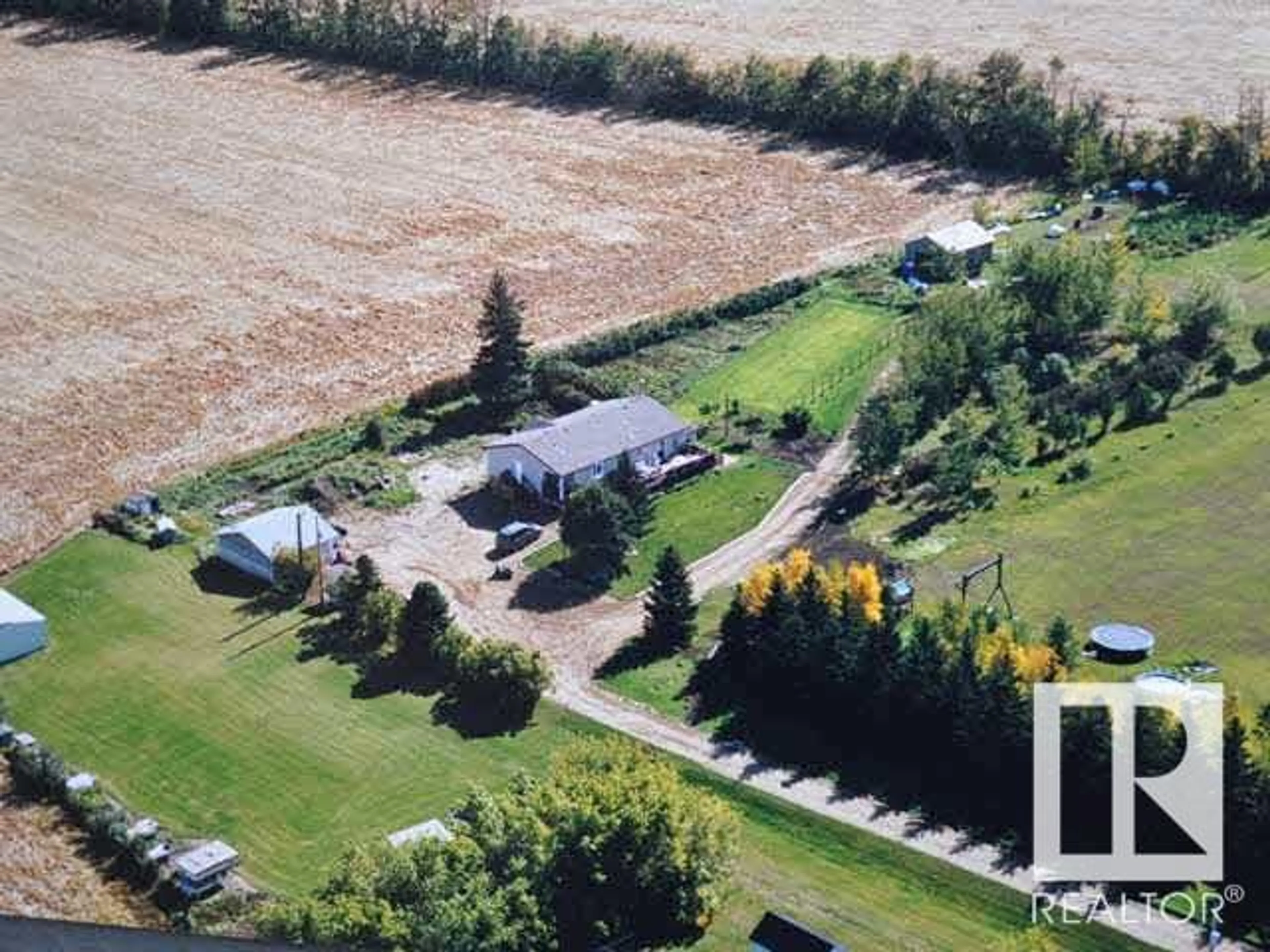 A pic from outside/outdoor area/front of a property/back of a property/a pic from drone, street for 56103A RR 250, Rural Sturgeon County Alberta T8R1P4