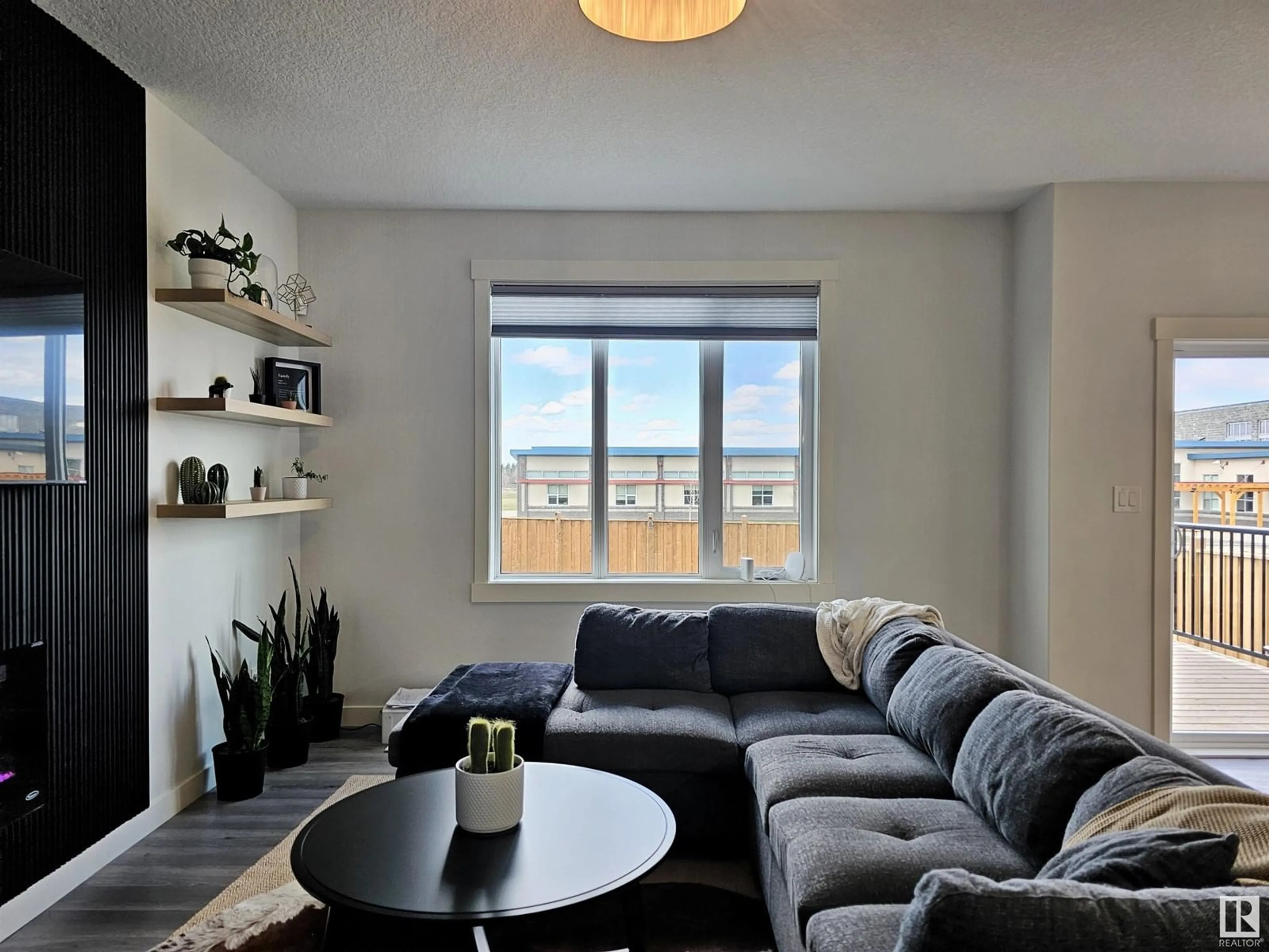 Living room with furniture, unknown for 5024 53 AVE, Calmar Alberta T0C0V0