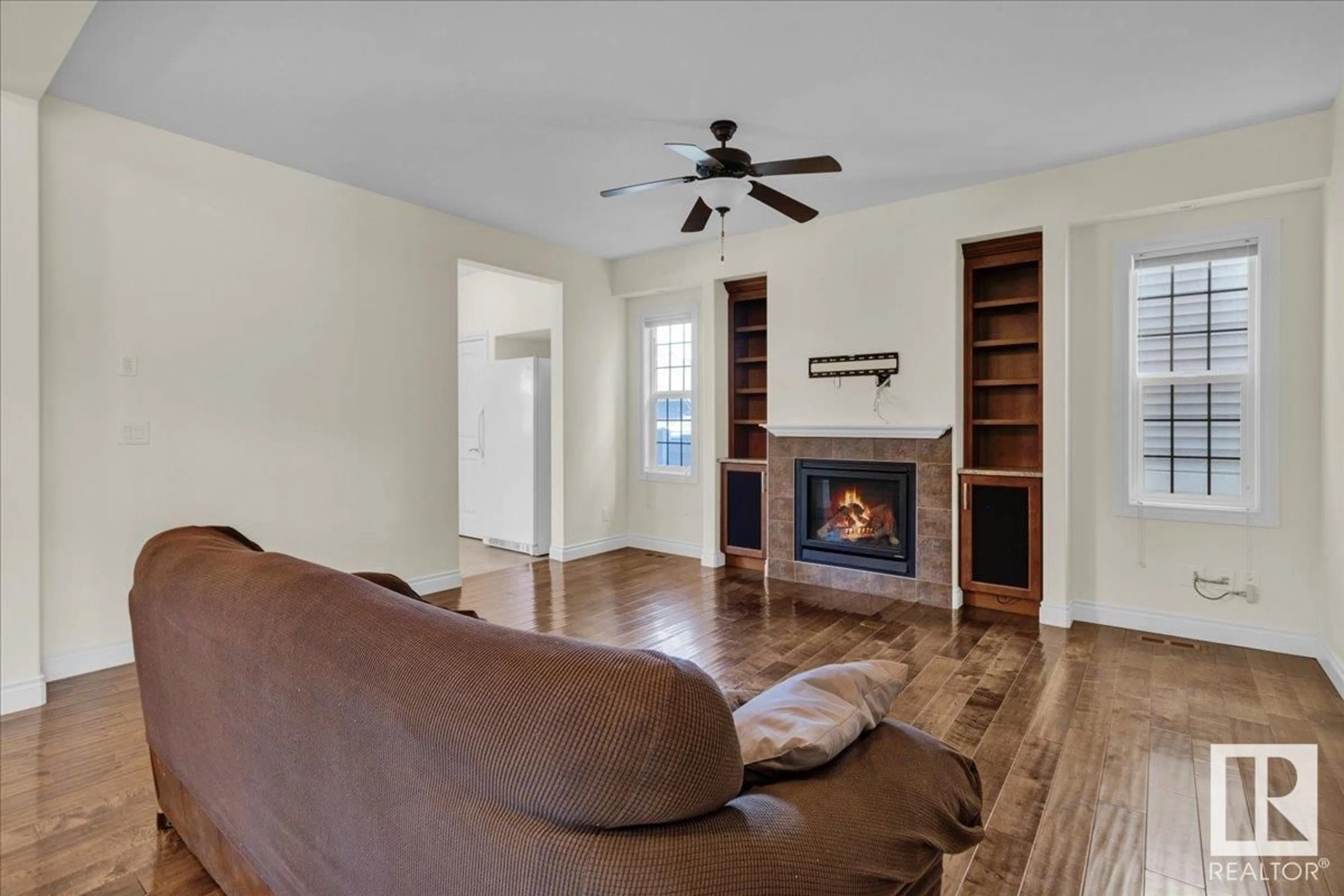 Living room with furniture, wood/laminate floor for 5512 CONESTOGA ST, Edmonton Alberta T5E6R6