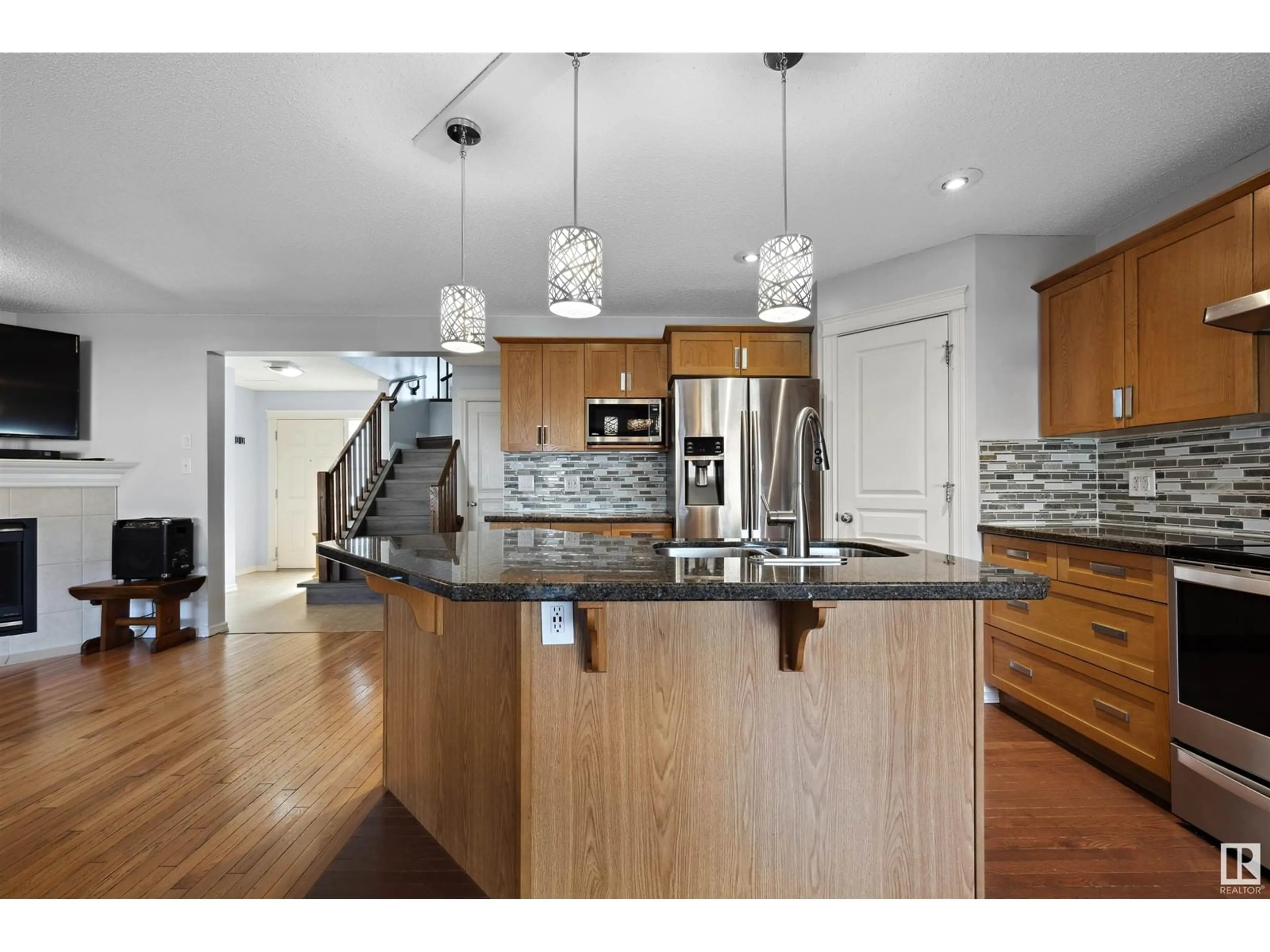 Open concept kitchen, unknown for 8918 179A AV, Edmonton Alberta T5Z0A6