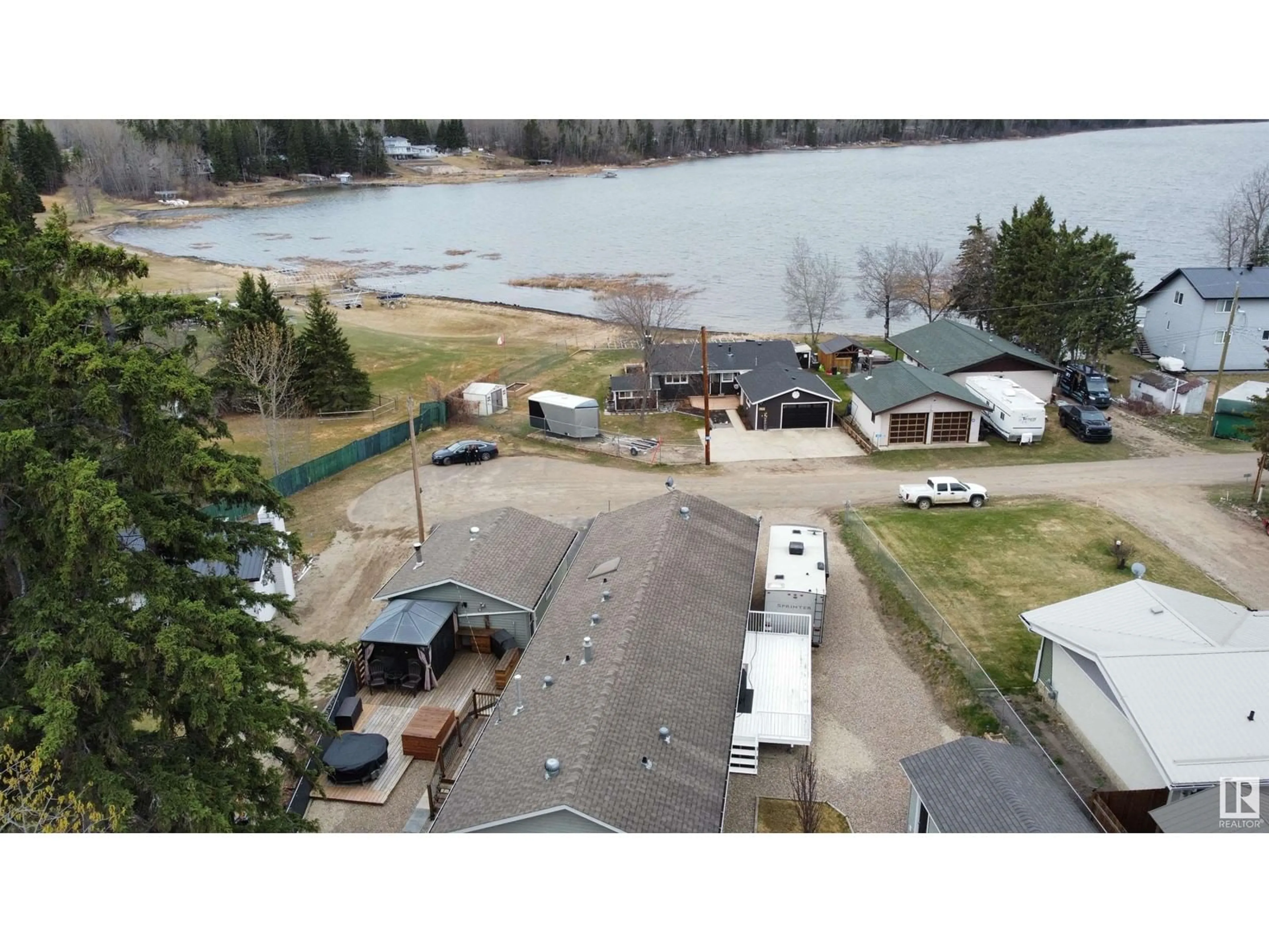 A pic from outside/outdoor area/front of a property/back of a property/a pic from drone, water/lake/river/ocean view for 610 LAKEVIEW ROAD, Rural Athabasca County Alberta T0A0M0