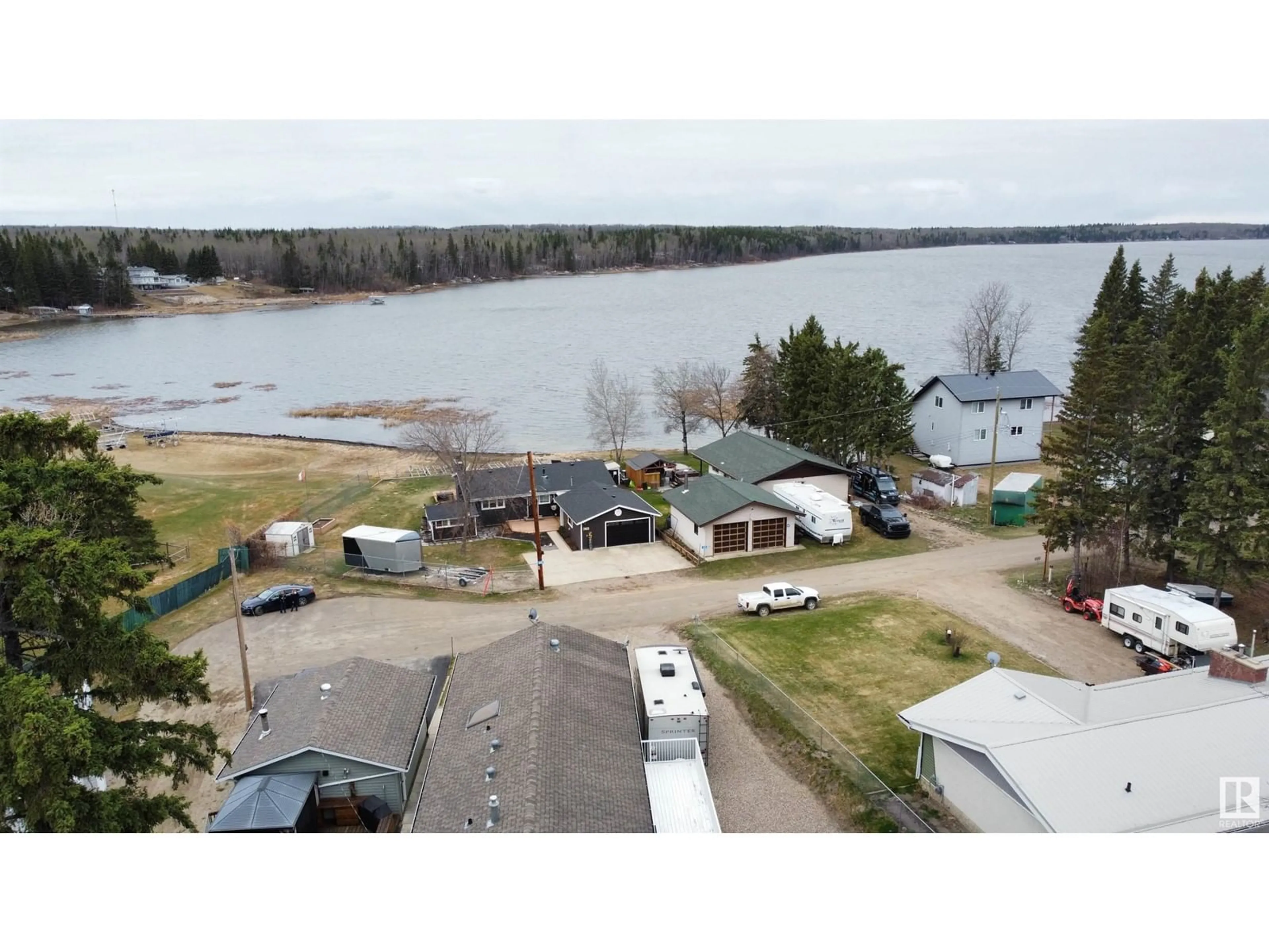 A pic from outside/outdoor area/front of a property/back of a property/a pic from drone, water/lake/river/ocean view for 610 LAKEVIEW ROAD, Rural Athabasca County Alberta T0A0M0
