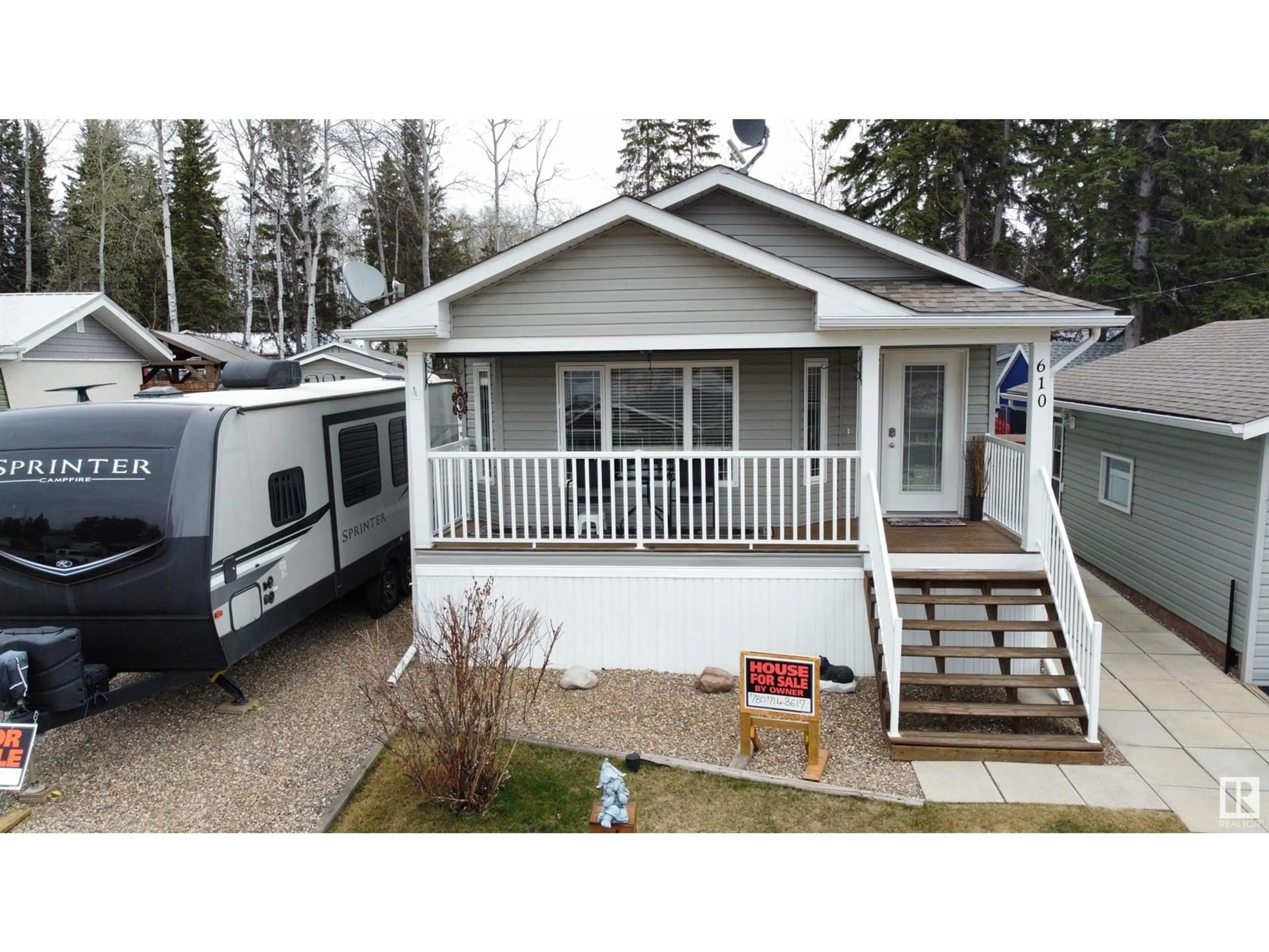 Home with vinyl exterior material, street for 610 LAKEVIEW ROAD, Rural Athabasca County Alberta T0A0M0