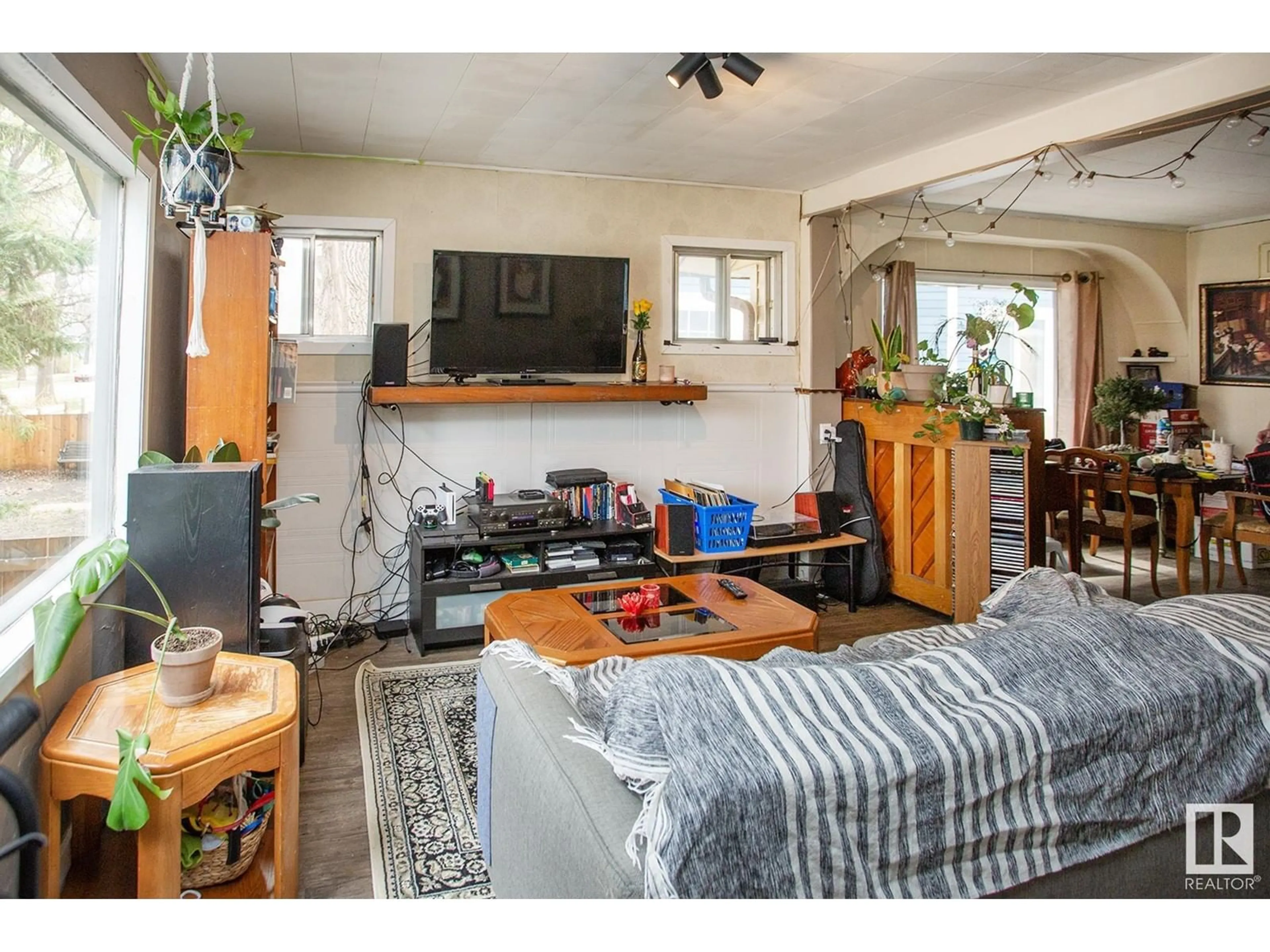 Living room with furniture, unknown for 11528 93 ST, Edmonton Alberta T5G1C7