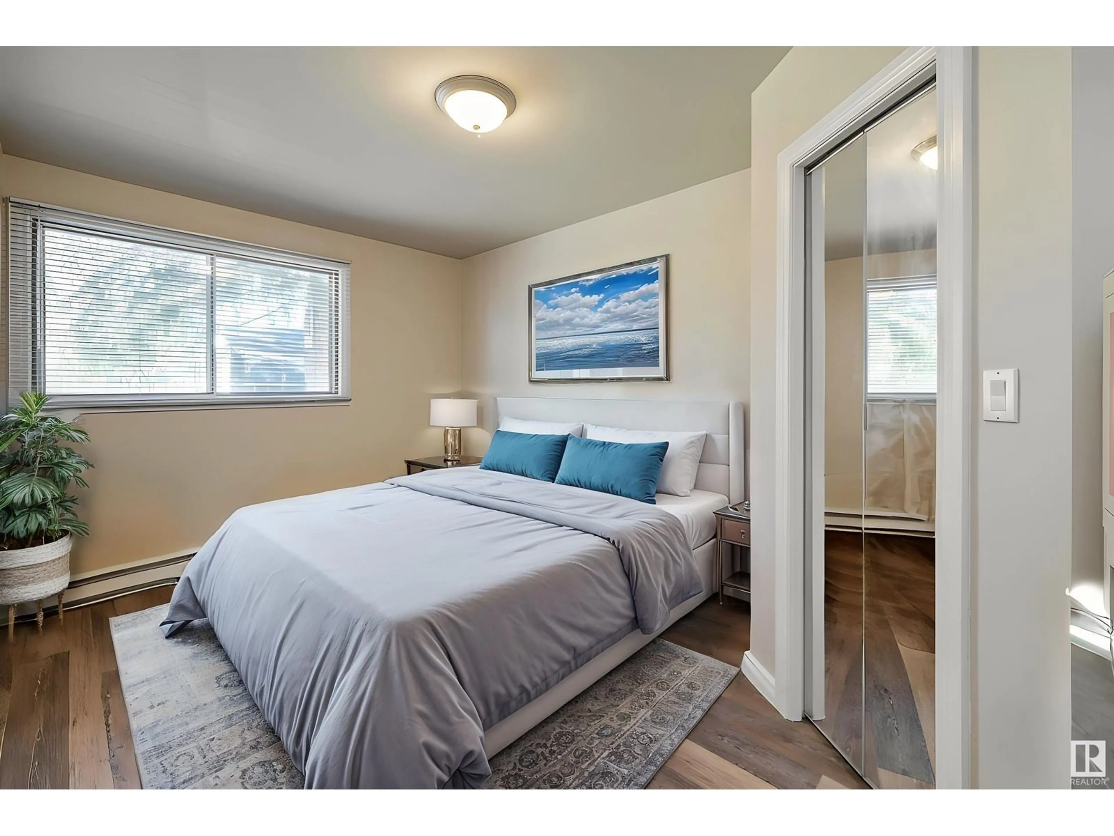 Bedroom with bed, wood/laminate floor for NW - 9712 162 ST, Edmonton Alberta T5P3K9