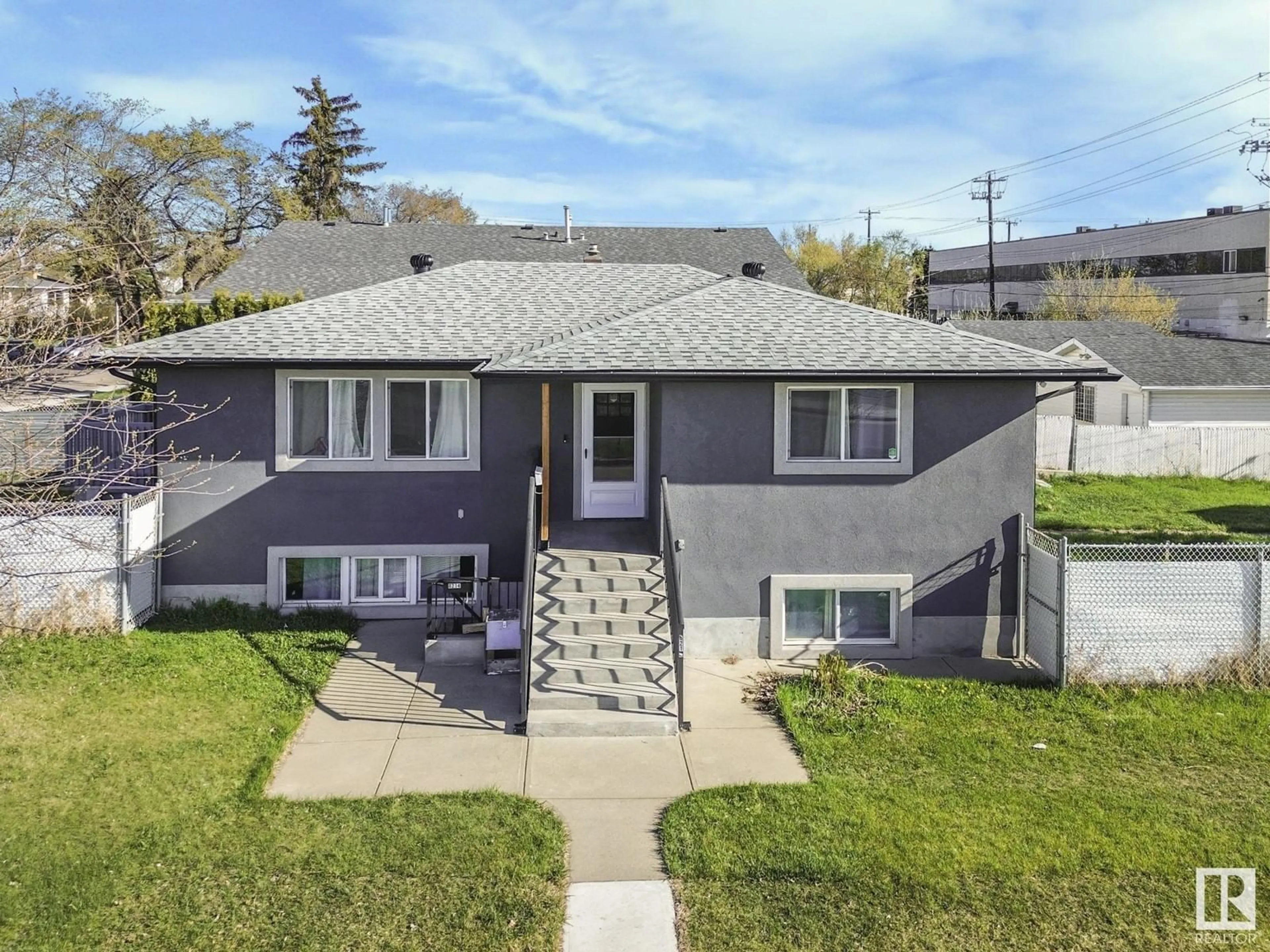 A pic from outside/outdoor area/front of a property/back of a property/a pic from drone, street for 8214 127 AV, Edmonton Alberta T5E0A2