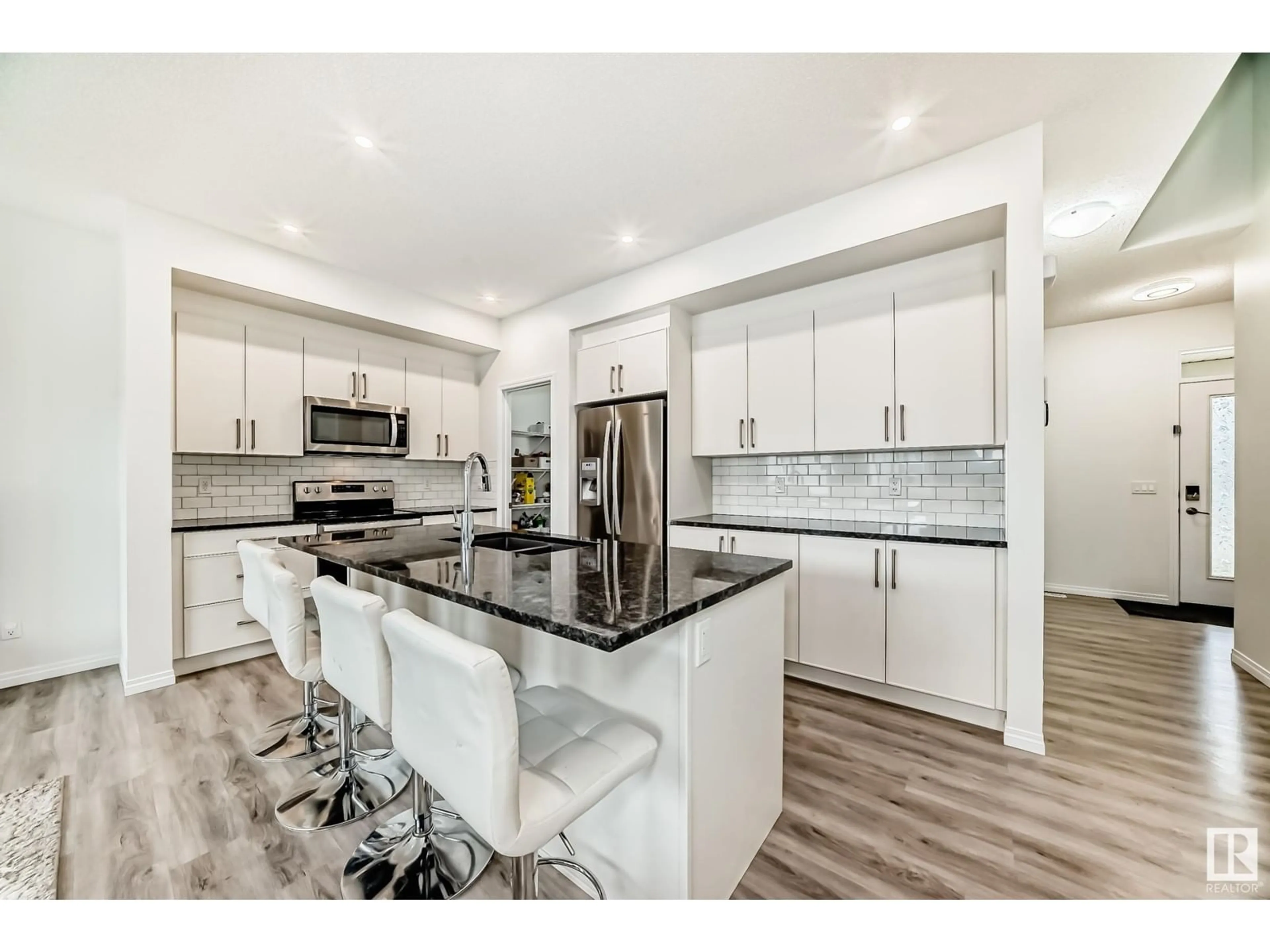 Open concept kitchen, ceramic/tile floor for SW - 3608 6 AV, Edmonton Alberta T6X2Y3