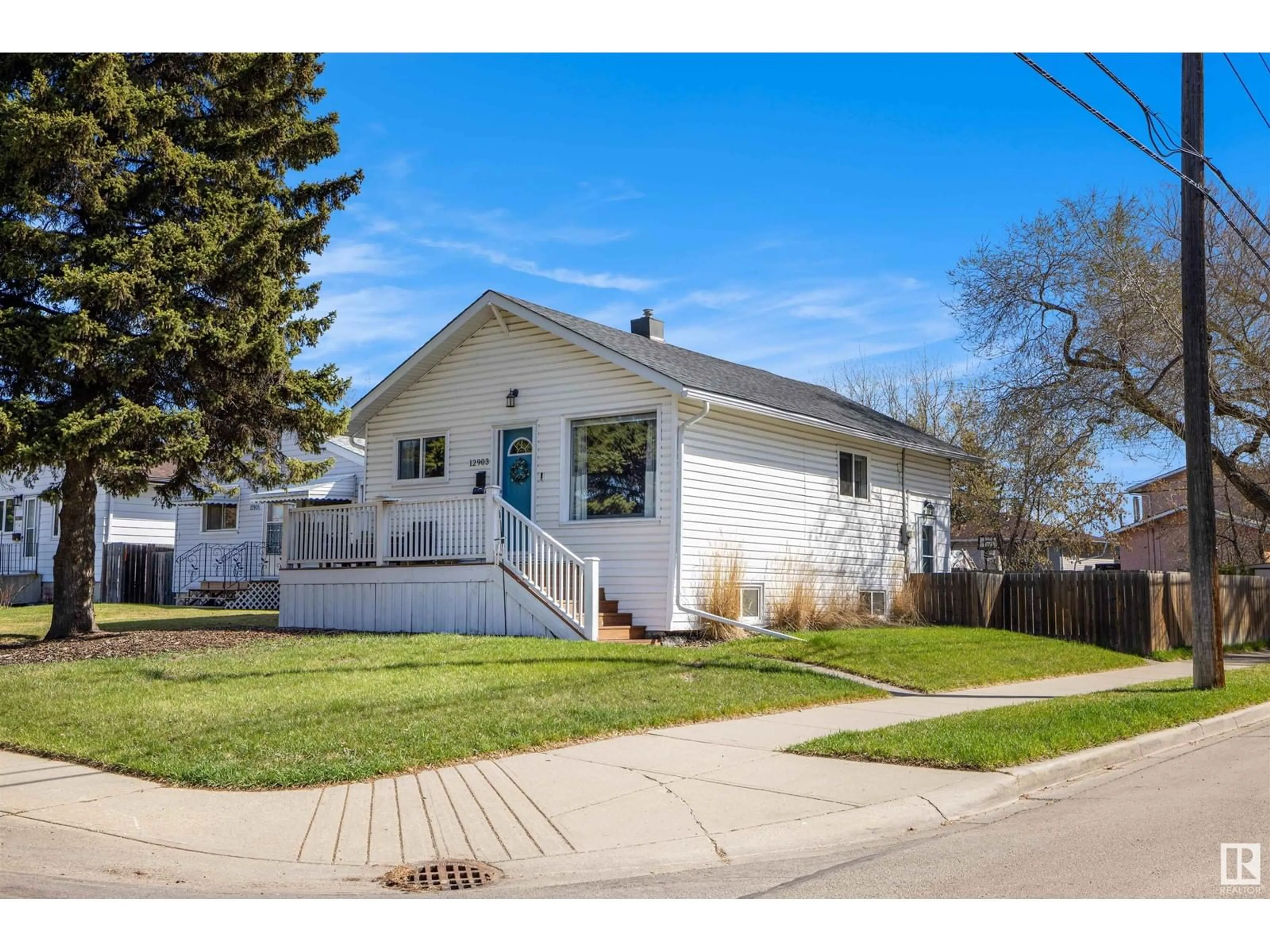 Home with vinyl exterior material, street for NW - 12903 133 ST, Edmonton Alberta T5L1S9