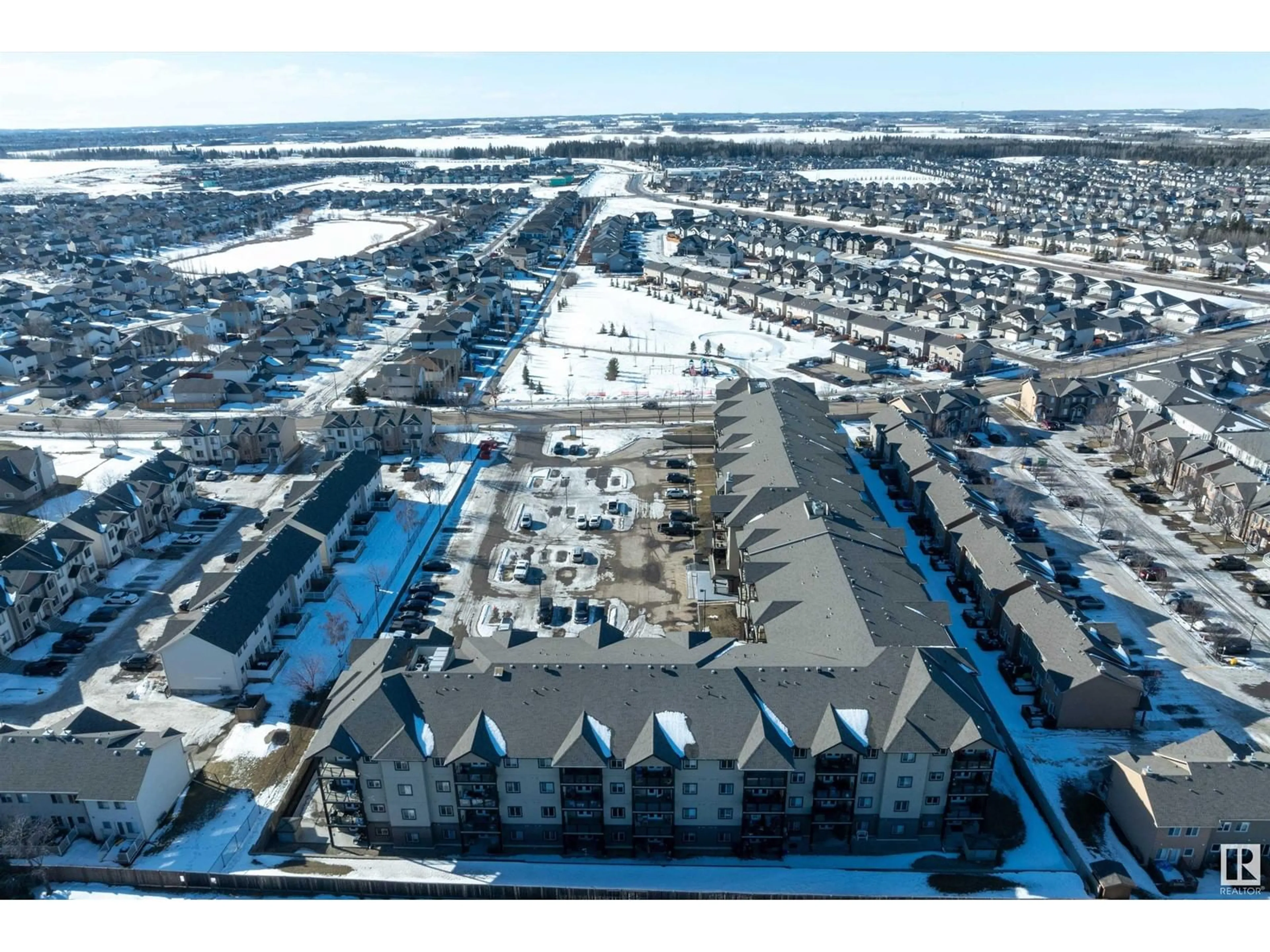A pic from outside/outdoor area/front of a property/back of a property/a pic from drone, street for #332 - 300 SPRUCE RIDGE RD, Spruce Grove Alberta T7X3E6